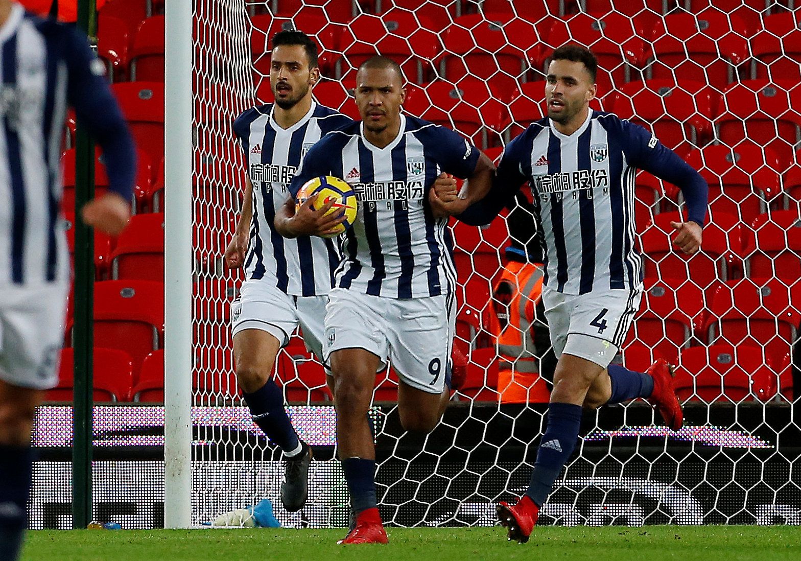 Soccer Football - Premier League - Stoke City vs West Bromwich Albion - bet365 Stadium, Stoke-on-Trent, Britain - December 23, 2017   West Bromwich Albion's Salomon Rondon celebrates scoring their first goal with Nacer Chadli and Hal Robson-Kanu    Action Images via Reuters/Craig Brough    EDITORIAL USE ONLY. No use with unauthorized audio, video, data, fixture lists, club/league logos or "live" services. Online in-match use limited to 75 images, no video emulation. No use in betting, games or s