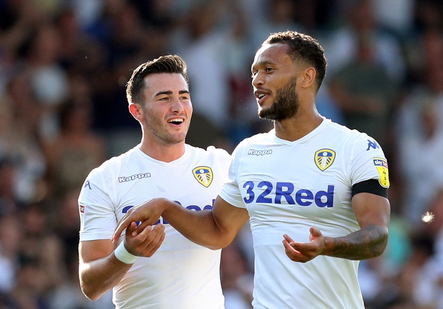 Soccer Football - Championship - Leeds United v Stoke City - Elland Road, Leeds, Britain - August 5, 2018   Leeds United's Jack Harrison and Lewis Baker celebrate at the end of the game   Action Images/John Clifton    EDITORIAL USE ONLY. No use with unauthorized audio, video, data, fixture lists, club/league logos or "live" services. Online in-match use limited to 75 images, no video emulation. No use in betting, games or single club/league/player publications. Please contact your account repres