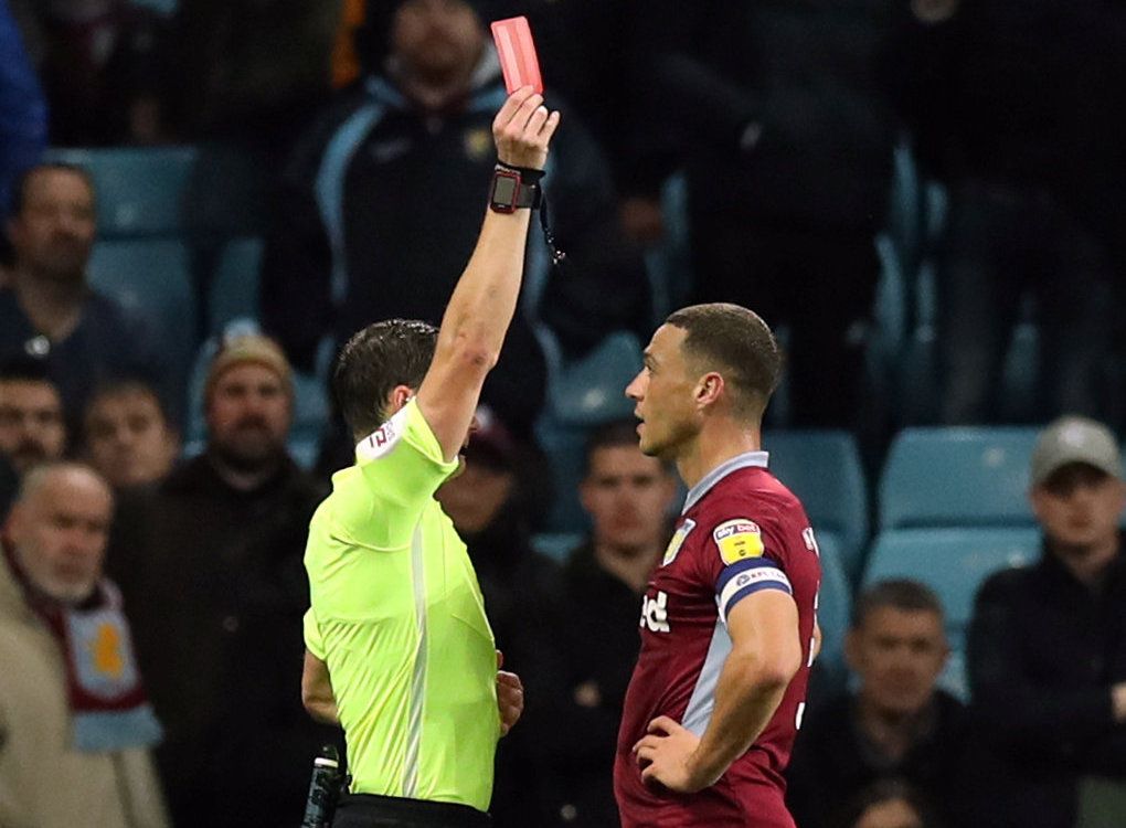 Soccer Football - Championship - Aston Villa v Preston North End - Villa Park, Birmingham, Britain - October 2, 2018   Aston Villa's James Chester is shown a red card by referee Darren England   Action Images/Peter Cziborra    EDITORIAL USE ONLY. No use with unauthorized audio, video, data, fixture lists, club/league logos or 