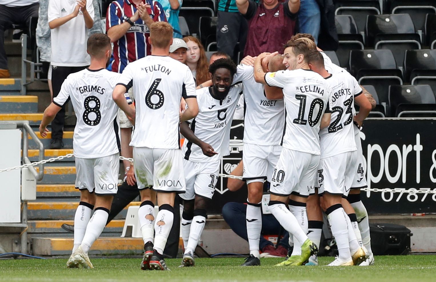 Soccer Football - Championship - Swansea City v Hull City - Liberty Stadium, Swansea, Britain - August 3, 2019   Swansea City's Mike Van Der Hoorn celebrates scoring their second goal with teammates   Action Images/Matthew Childs    EDITORIAL USE ONLY. No use with unauthorized audio, video, data, fixture lists, club/league logos or "live" services. Online in-match use limited to 75 images, no video emulation. No use in betting, games or single club/league/player publications.  Please contact you