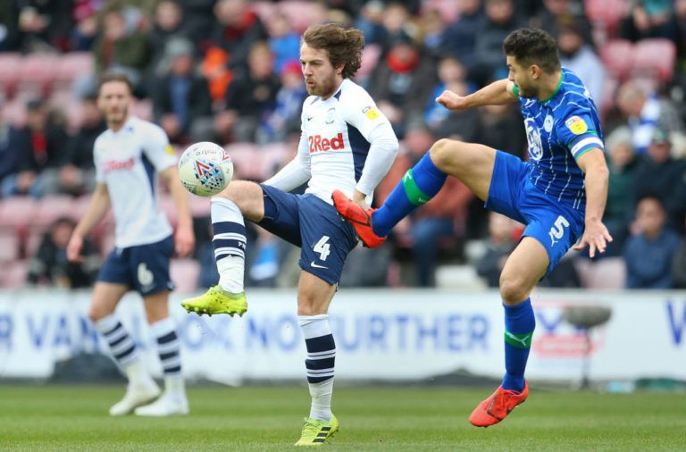 WIGAN, ENGLAND - FEBRUARY 08:   Samy Morsy of Wigan Athletic challenges Ben Pearson of Preston North End during the Sky Bet Championship match between Wigan Athletic and Preston North End at DW Stadium on February 08, 2020 in Wigan, England. (Photo by James Gill - Danehouse/Getty Images)