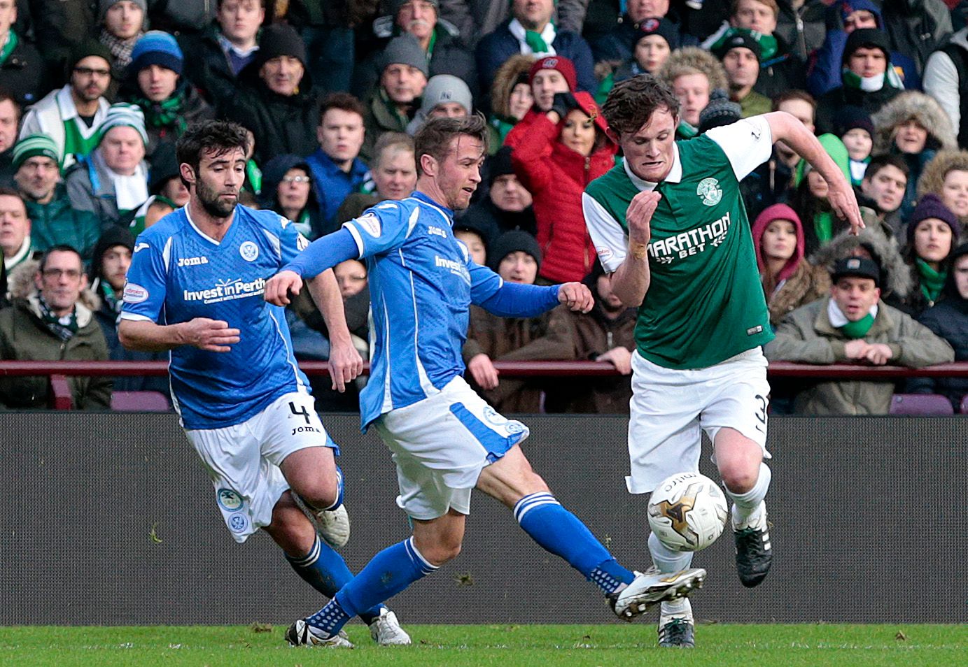 Football Soccer - Hibernian v St Johnstone - Scottish League Cup Semi Final - Tynecastle, Edinburgh, Scotland - 30/1/16 
St Johnstone's Chris Millar (C) fouls  Hibernian's Liam Henderson (R) to concede a penalty 
Action Images via Reuters / Graham Stuart 
Livepic 
EDITORIAL USE ONLY. No use with unauthorized audio, video, data, fixture lists, club/league logos or 