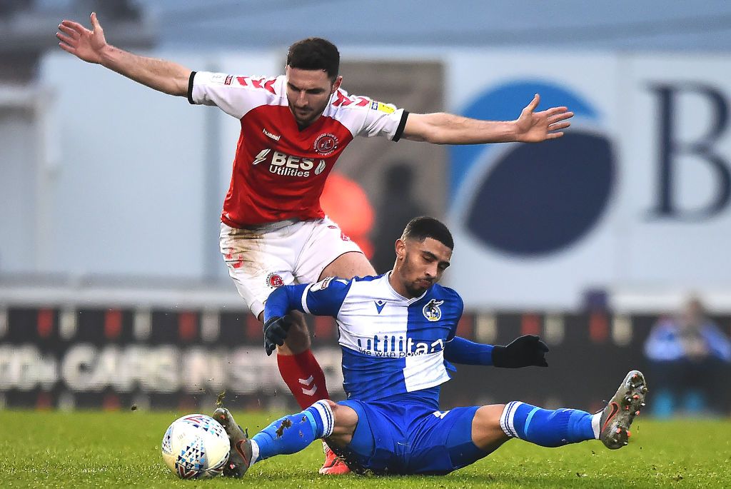 BRISTOL, ENGLAND - JANUARY 25: Fleetwood Town's Lewis Coyle is challenged by Bristol Rovers' Josh Ginnelly during the Sky Bet League One match between Bristol Rovers and Fleetwood Town at Memorial Stadium on January 25, 2020 in Bristol, England. (Photo by Richard Martin-Roberts - CameraSport via Getty Images)