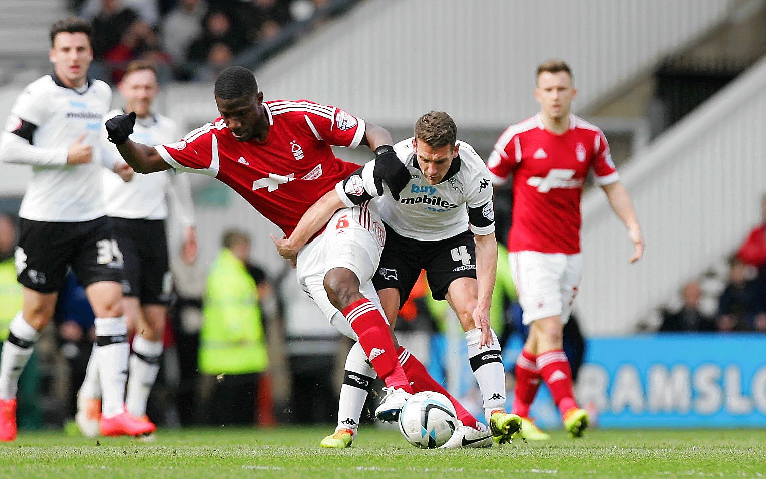 Football - Derby County v Nottingham Forest - Sky Bet Football League Championship - iPro Stadium - 22/3/14 
Nottingham Forest's Guy Moussi (L) in action with Derby's Craig Bryson 
Mandatory Credit: Action Images / David Field  
Livepic 
EDITORIAL USE ONLY. No use with unauthorized audio, video, data, fixture lists, club/league logos or 