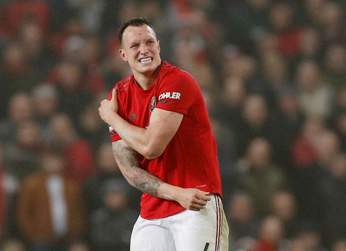 Soccer Football - Premier League - Manchester United v Burnley - Old Trafford, Manchester, Britain - January 22, 2020  Manchester United's Phil Jones reacts REUTERS/Phil Noble  EDITORIAL USE ONLY. No use with unauthorized audio, video, data, fixture lists, club/league logos or 