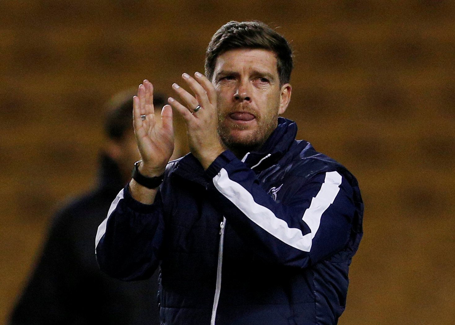 Soccer Football - Carabao Cup Third Round - Wolverhampton Wanderers vs Bristol Rovers - Molineux Stadium, Wolverhampton, Britain - September 19, 2017   Bristol Rovers manager Darrell Clarke applauds the fans after the match   Action Images/Craig Brough   EDITORIAL USE ONLY. No use with unauthorized audio, video, data, fixture lists, club/league logos or 