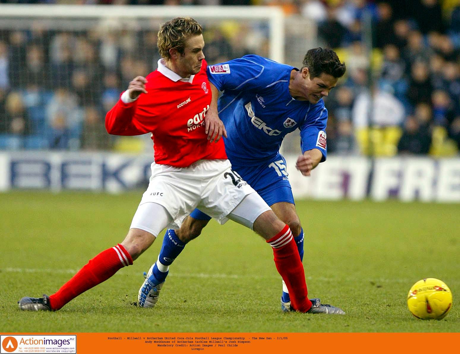 Football - Millwall v Rotherham United Coca-Cola Football League Championship  - The New Den - 3/1/05 
Andy Monkhouse of Rotherham tackles Millwall's Josh Simpson 
Mandatory Credit: Action Images / Paul Childs 
Livepic