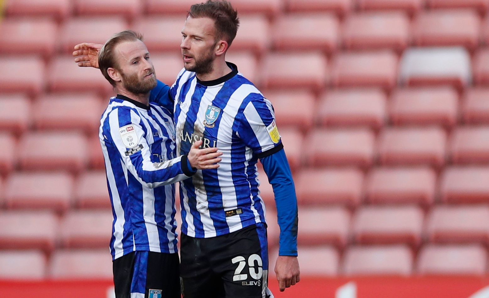 Soccer Football - Championship - Barnsley v Sheffield Wednesday - Oakwell, Barnsley, Britain - March 20, 2021 Sheffield Wednesday's Barry Bannan and Jordan Rhodes celebrate after the match Action Images/Andrew Boyers EDITORIAL USE ONLY. No use with unauthorized audio, video, data, fixture lists, club/league logos or 'live' services. Online in-match use limited to 75 images, no video emulation. No use in betting, games or single club /league/player publications.  Please contact your account repre