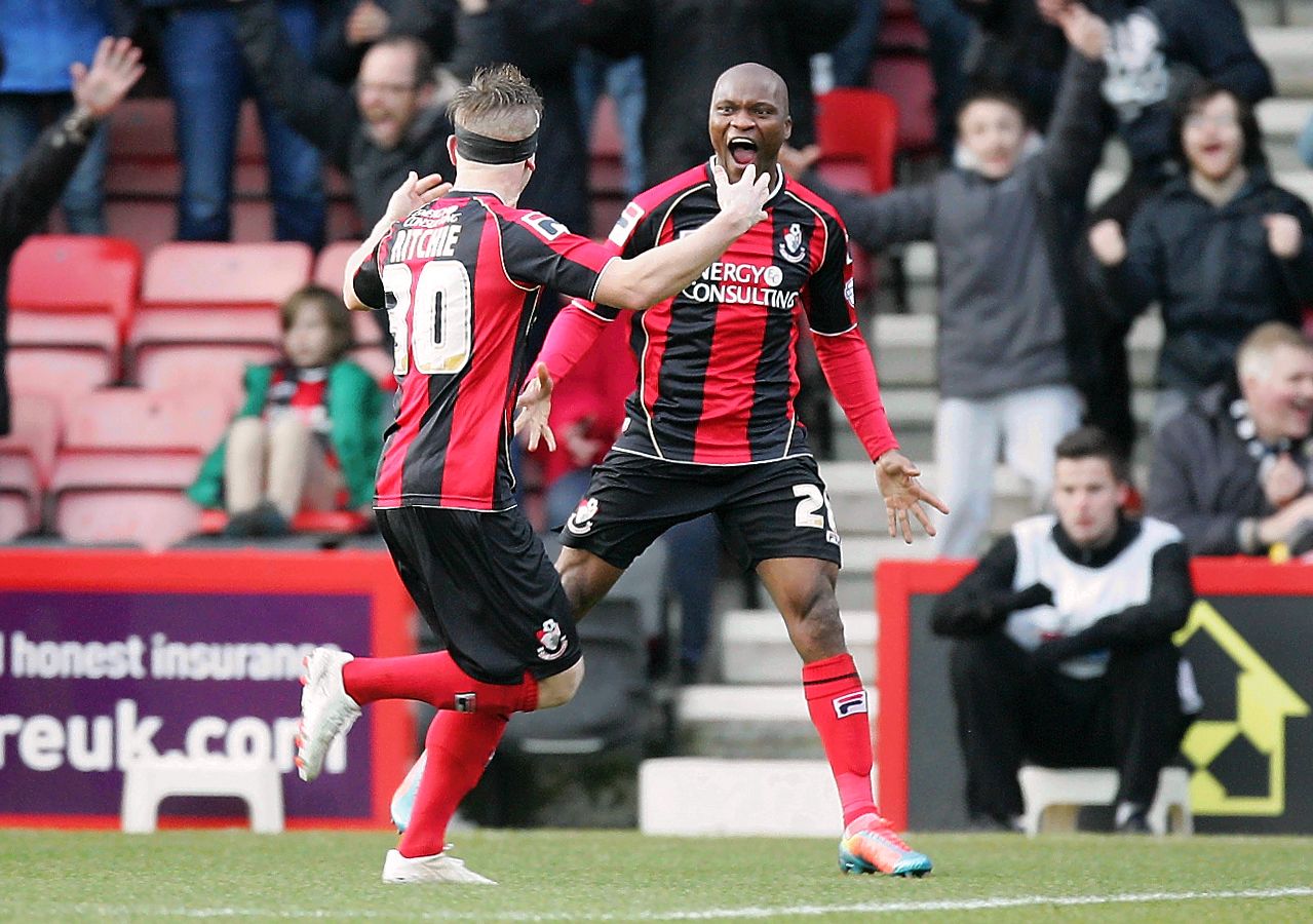 Football - AFC Bournemouth v Burnley - Sky Bet Football League Championship - Goldsands Stadium, Dean Court - 15/2/14 
Tokelo Rantie (R) celebrates scoring Bournemouth's first goal  
Mandatory Credit: Action Images / David Field 
Livepic 
EDITORIAL USE ONLY. No use with unauthorized audio, video, data, fixture lists, club/league logos or live services. Online in-match use limited to 45 images, no video emulation. No use in betting, games or single club/league/player publications.  Please contact