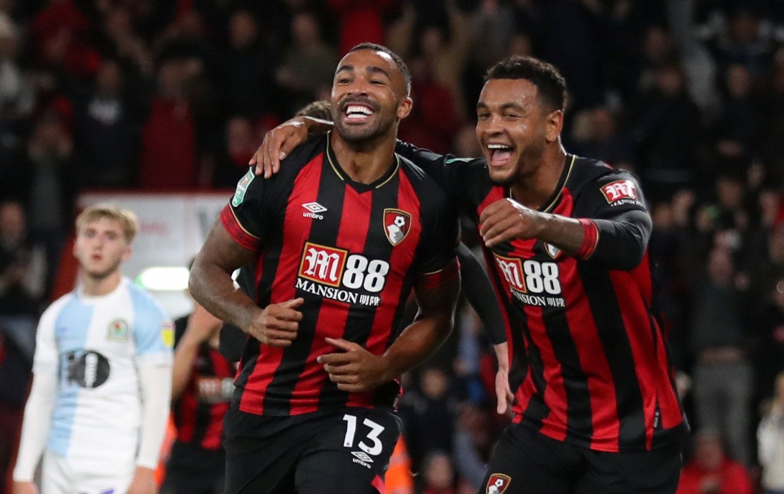 Soccer Football - Carabao Cup - Third Round - AFC Bournemouth v Blackburn Rovers - Vitality Stadium, Bournemouth, Britain - September 25, 2018  Bournemouth's Callum Wilson celebrates scoring their third goal with Joshua King            Action Images via Reuters/Peter Cziborra  EDITORIAL USE ONLY. No use with unauthorized audio, video, data, fixture lists, club/league logos or 