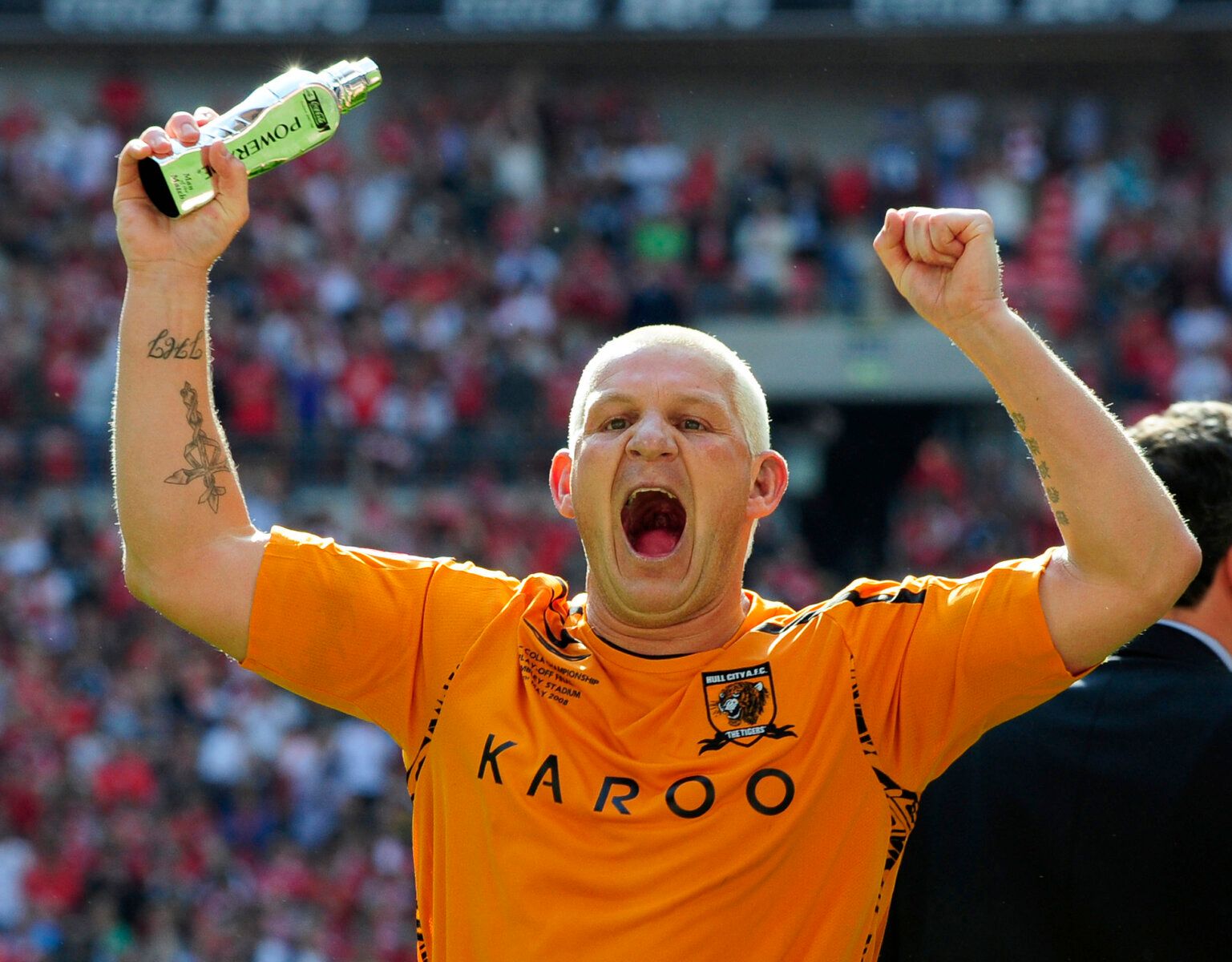 Hull City's Dean Windass reacts after beating Bristol City in the Championship playoff for a place in the English Premier League at Wembley Stadium in London May 24, 2008.  REUTERS/ Eddie Keogh (BRITAIN)