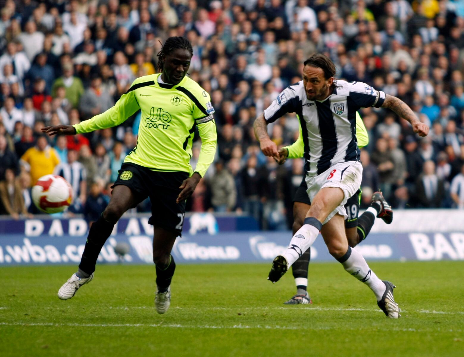 Football - West Bromwich Albion  v Wigan Athletic Barclays Premier League - The Hawthorns - 9/5/09 
Jonathan Greening of West Brom shoots on goal  
Mandatory Credit: Action Images / Peter Ford 
Livepic 
NO ONLINE/INTERNET USE WITHOUT A LICENCE FROM THE FOOTBALL DATA CO LTD. FOR LICENCE ENQUIRIES PLEASE TELEPHONE +44 (0) 207 864 9000.