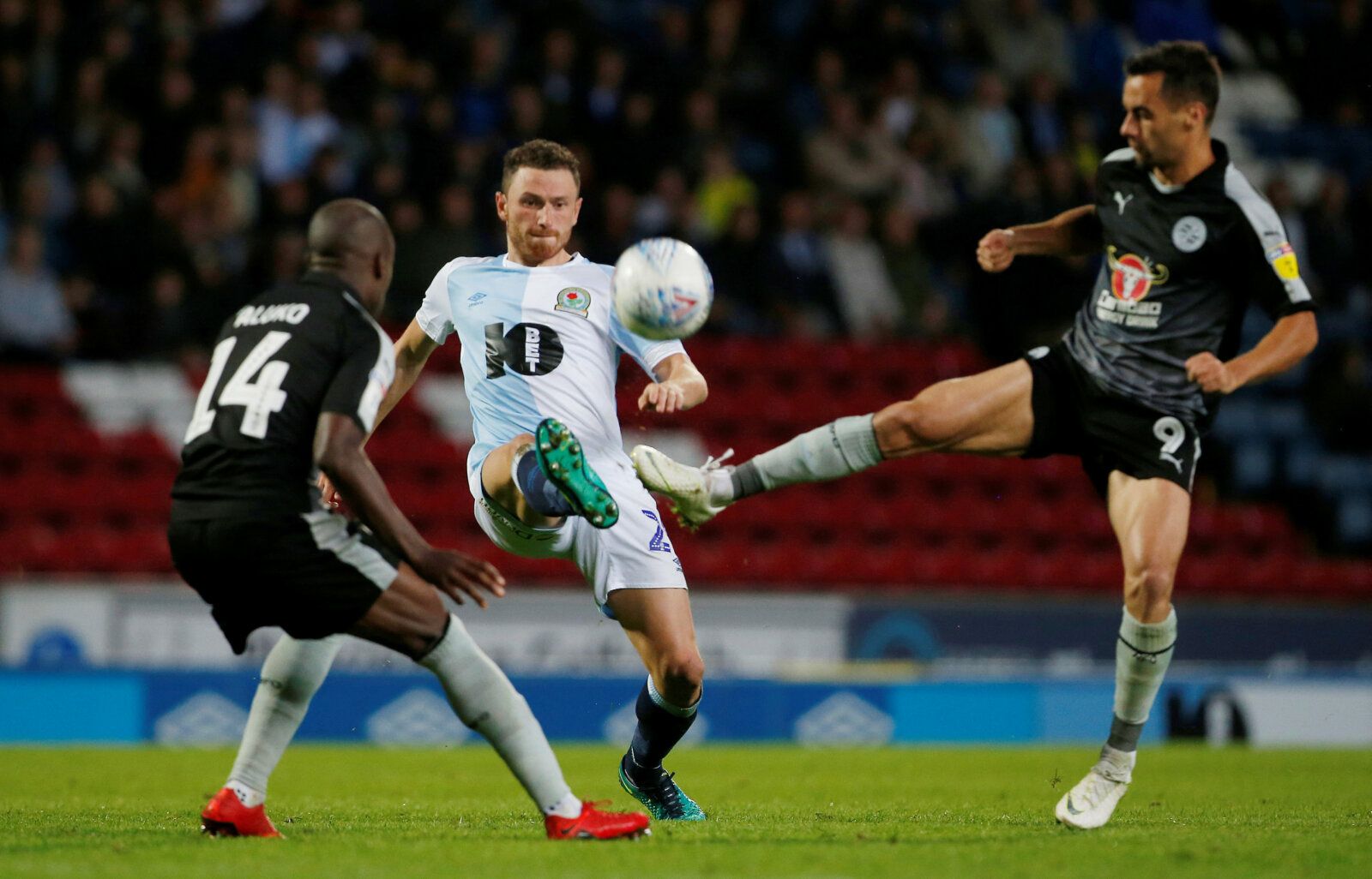 Soccer Football - Championship - Blackburn Rovers v Reading - Ewood Park, Blackburn, Britain - August 22, 2018   Blackburn Rovers' Corry Evans in action with Reading's Sone Aluko and Sam Baldock   Action Images/Craig Brough    EDITORIAL USE ONLY. No use with unauthorized audio, video, data, fixture lists, club/league logos or 