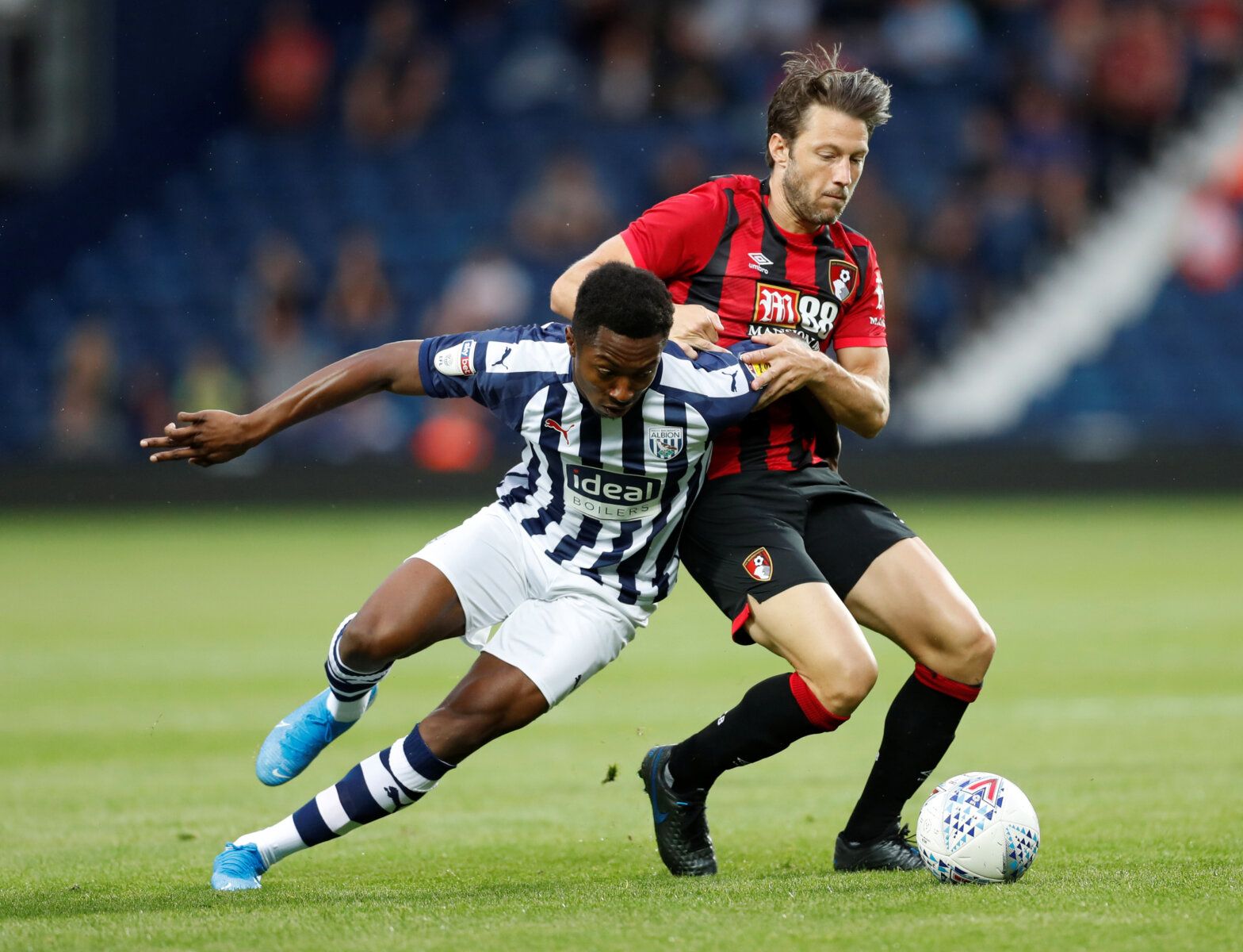 Soccer Football - Pre Season Friendly - West Bromwich Albion v AFC Bournemouth - The Hawthorns, West Bromwich, Britain - July 26, 2019   West Brom's Kyle Edwards in action with Bournemouth's Harry Arter   Action Images via Reuters/Matthew Childs