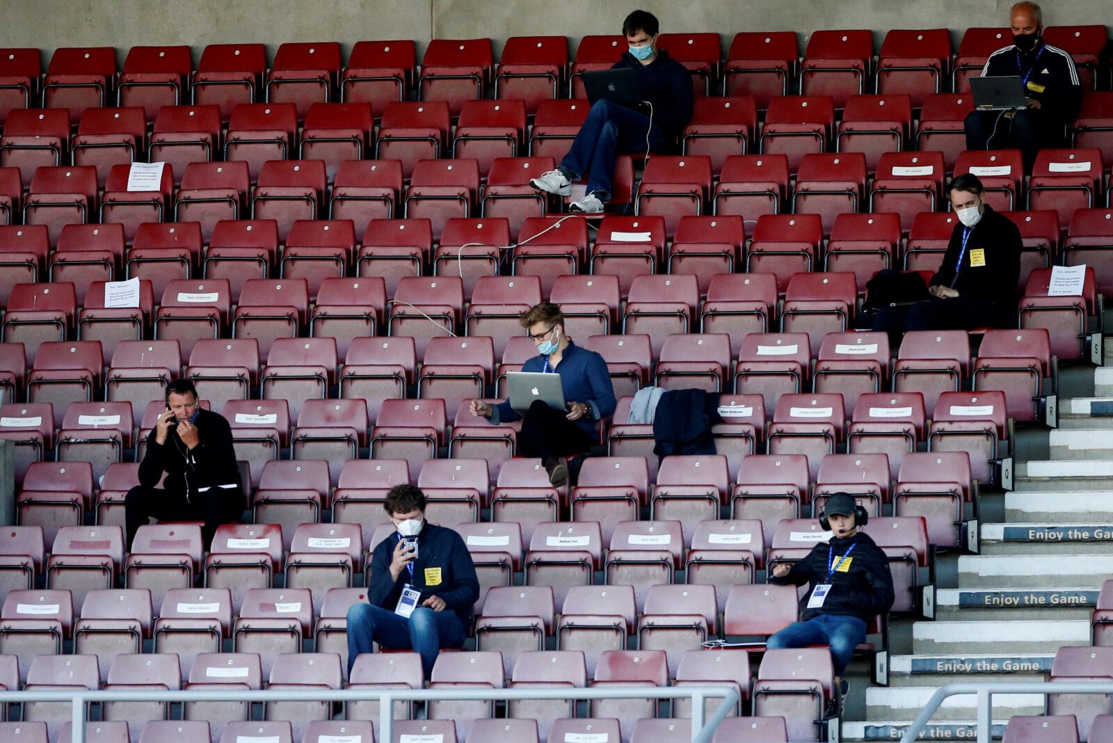 Soccer Football - League Two - Semi Final First Leg - Northampton Town v Cheltenham Town - Sixfields Stadium, Northampton, Britain - June 18, 2020   A general view of members of the media sat at a social distance in the stands as play resumes behind closed doors following the outbreak of the coronavirus disease (COVID-19)   Action Images/Andrew Boyers    EDITORIAL USE ONLY. No use with unauthorized audio, video, data, fixture lists, club/league logos or 