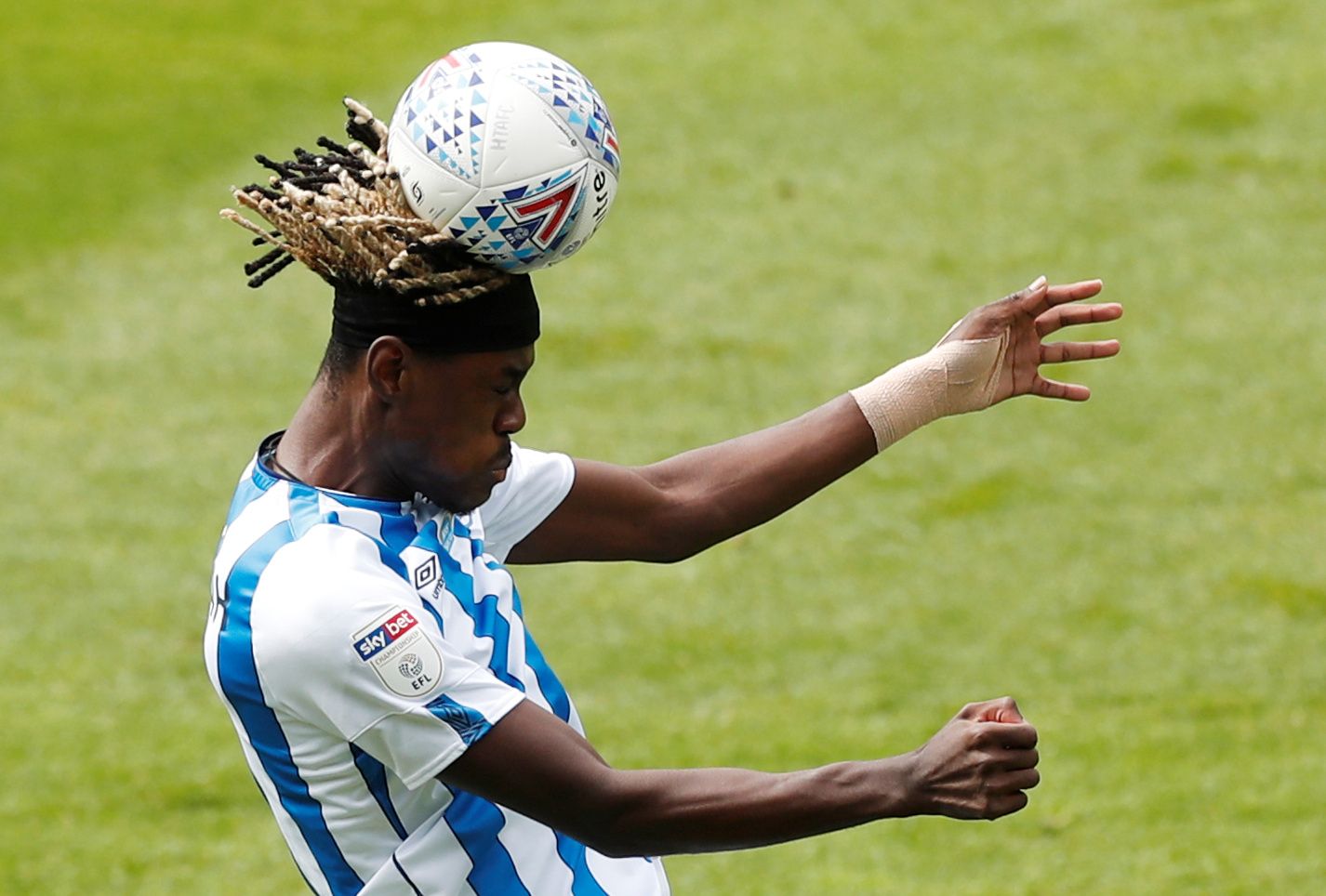 Soccer Football - Championship - Huddersfield Town v Preston North End - John Smith's Stadium, Huddersfield, Britain - July 4, 2020 Huddersfield's Trevoh Tom Chalobah in action, as play resumes behind closed doors following the outbreak of the coronavirus disease (COVID-19)  Action Images/Lee Smith  EDITORIAL USE ONLY. No use with unauthorized audio, video, data, fixture lists, club/league logos or 
