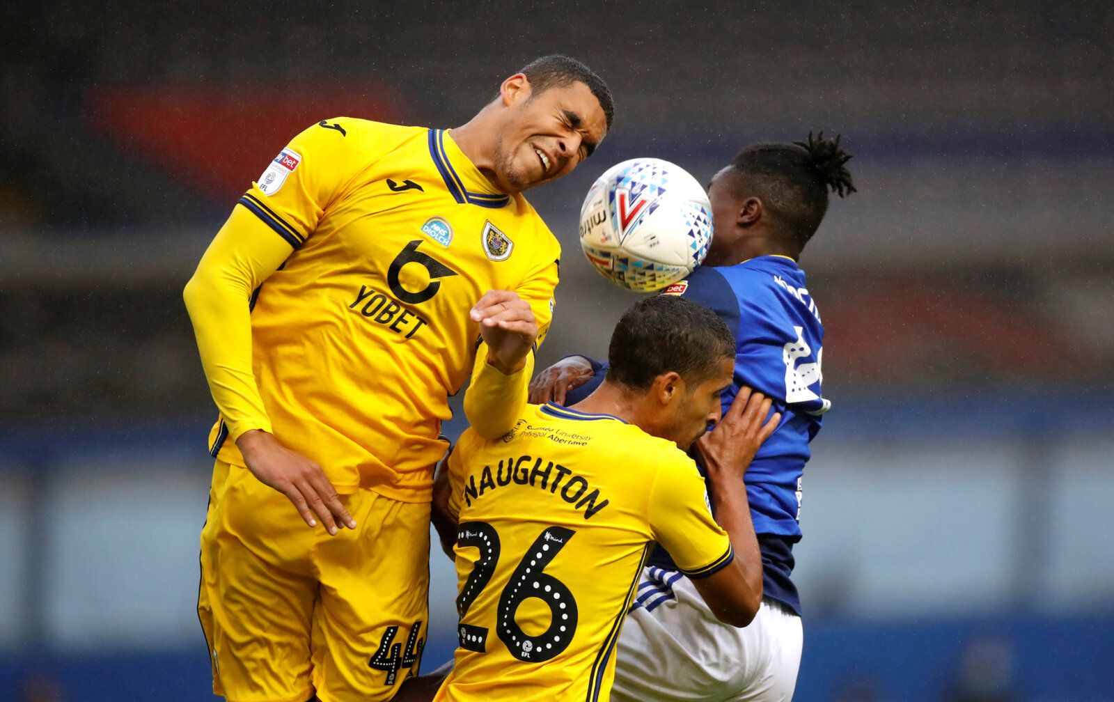 Soccer Football - Championship - Birmingham City v Swansea City - St Andrew's, Birmingham, Britain - July 8, 2020   Swansea City's Ben Cabango and Kyle Naughton in action with Birmingham City's Jayden Reid, as play resumes behind closed doors following the outbreak of the coronavirus disease (COVID-19)   Action Images/Andrew Boyers    EDITORIAL USE ONLY. No use with unauthorized audio, video, data, fixture lists, club/league logos or 