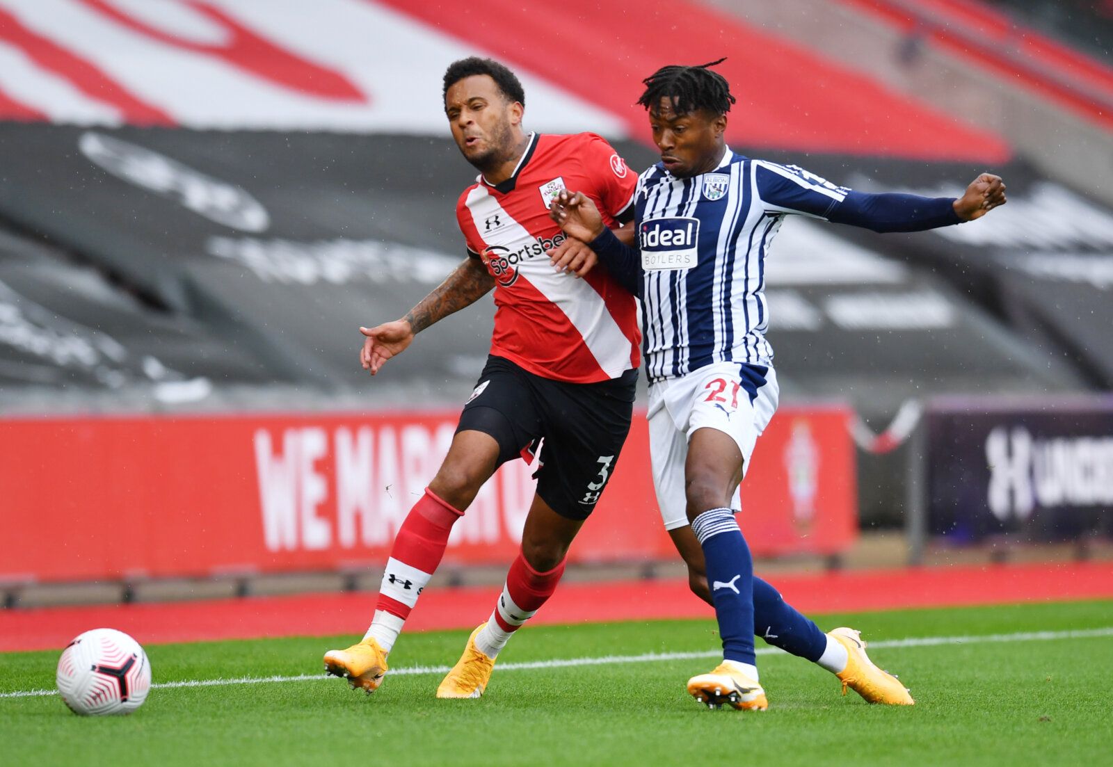 Soccer Football - Premier League - Southampton v West Bromwich Albion - St Mary's Stadium, Southampton, Britain - October 4, 2020 Southampton's Ryan Bertrand in action with West Bromwich Albion's Kyle Edwards Pool via REUTERS/Glyn Kirk EDITORIAL USE ONLY. No use with unauthorized audio, video, data, fixture lists, club/league logos or 'live' services. Online in-match use limited to 75 images, no video emulation. No use in betting, games or single club /league/player publications.  Please contact