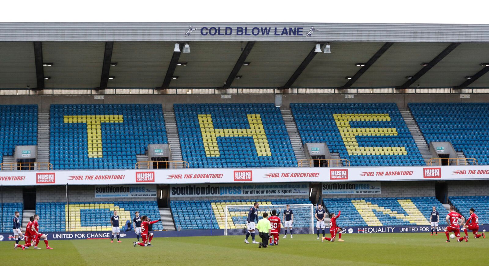 Soccer Football - FA Cup - Fourth Round - Millwall v Bristol City - The Den, London, Britain - January 23, 2021 Millwall players as Bristol City players kneel in support of the Black Lives Matter campaign before the match Action Images/Paul Childs