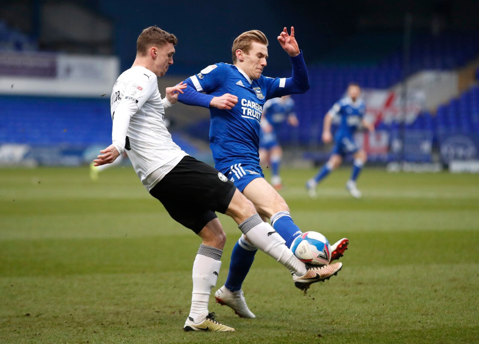 Soccer Football - League One - Ipswich Town v Peterborough United - Portman Road, Ipswich, Britain - January 23, 2021 Ipswich Town's Flynn Downes in action with Peterborough United's Jack Taylor Action Images/Matthew Childs EDITORIAL USE ONLY. No use with unauthorized audio, video, data, fixture lists, club/league logos or 'live' services. Online in-match use limited to 75 images, no video emulation. No use in betting, games or single club /league/player publications.  Please contact your accoun