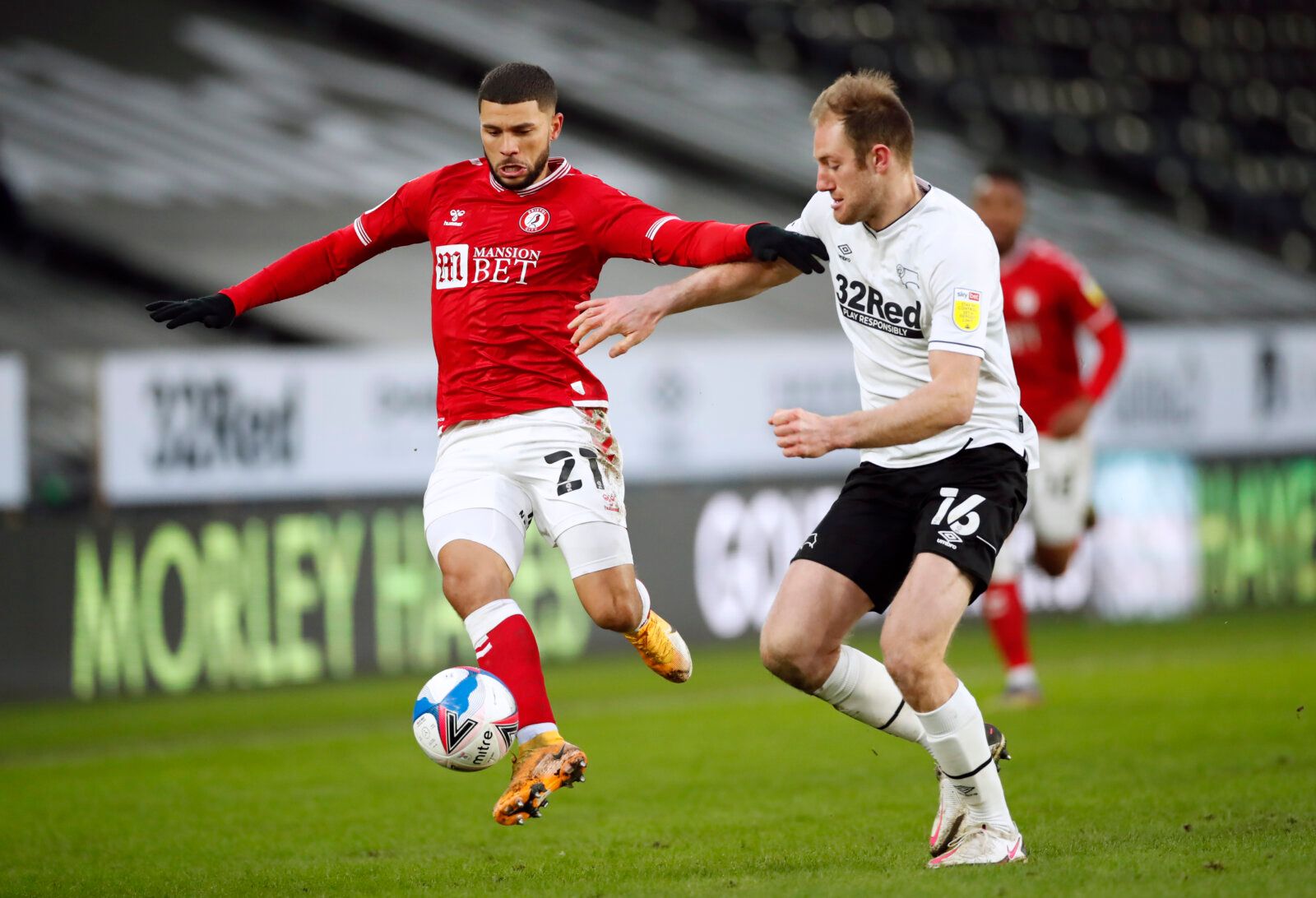 Soccer Football - Championship - Derby County v Bristol City - Pride Park, Derby, Britain - January 30, 2021 Bristol City's Nahki Wells in action with Derby County's Matt Clarke Action Images/Andrew Boyers EDITORIAL USE ONLY. No use with unauthorized audio, video, data, fixture lists, club/league logos or 'live' services. Online in-match use limited to 75 images, no video emulation. No use in betting, games or single club /league/player publications.  Please contact your account representative f