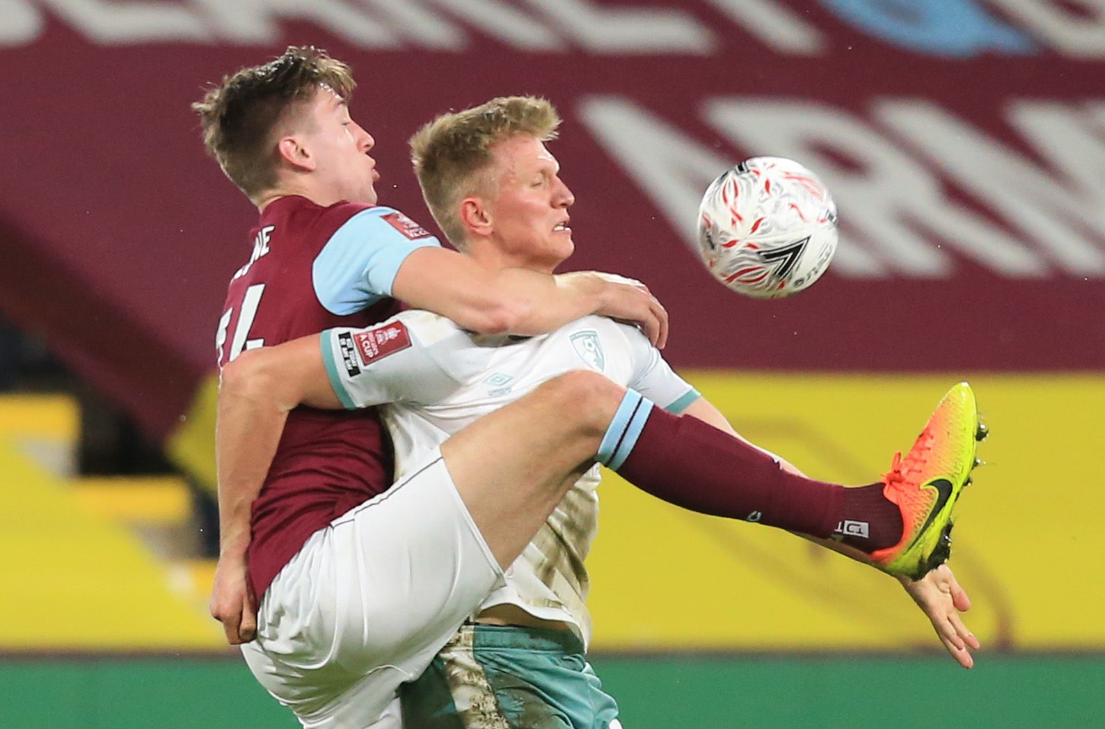 Soccer Football -  FA Cup - Fifth Round - Burnley v AFC Bournemouth  - Turf Moor, Burnley, Britain - February 9, 2021 AFC Bournemouth's Sam Surridge in action with Burnley's Jimmy Dunne Pool via REUTERS/Lindsey Parnaby