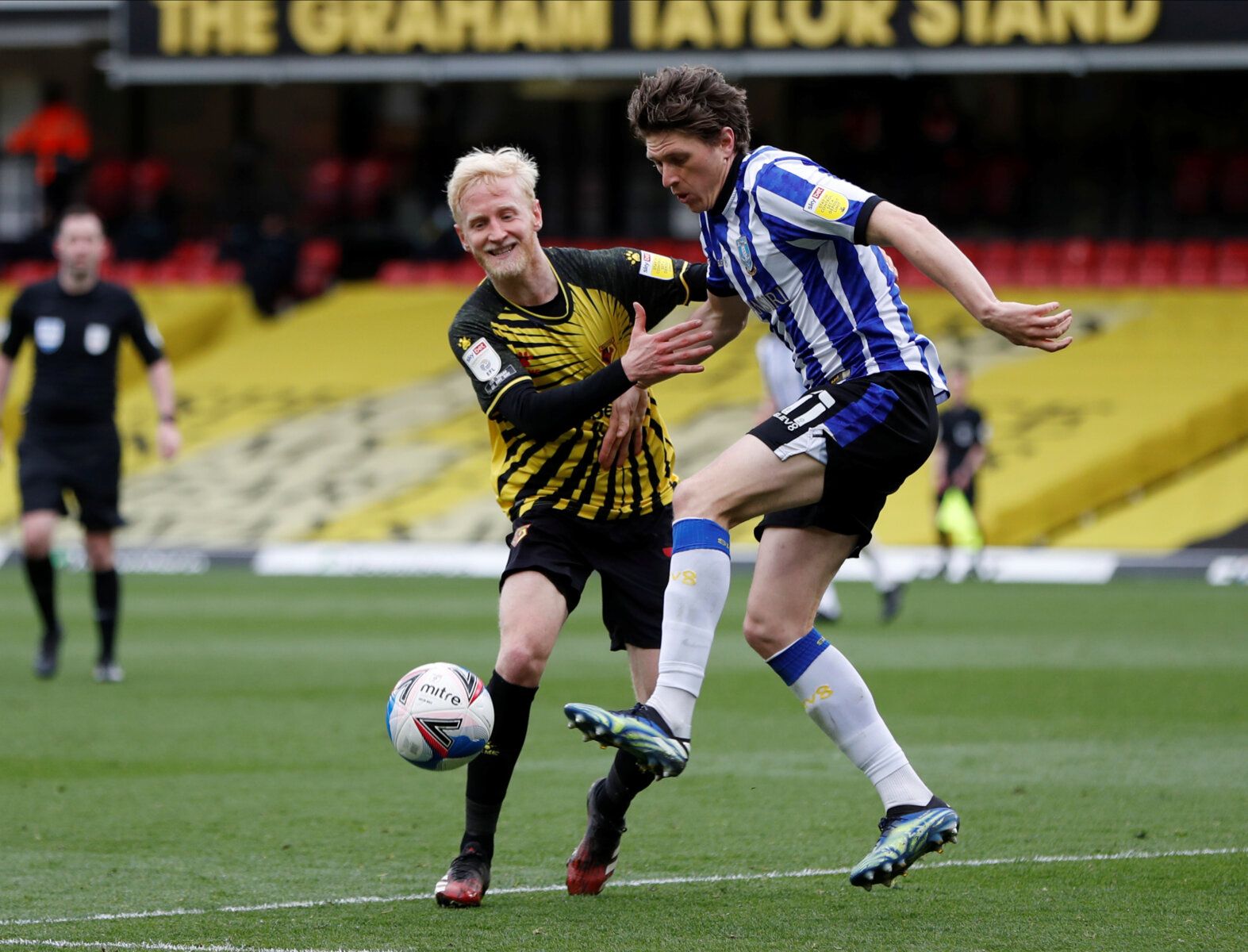 Soccer Football - Championship - Watford v Sheffield Wednesday - Vicarage Road, Watford, Britain - April 2, 2021  Watford's Will Hughes in action with Sheffield Wednesday's Adam Reach  Action Images/Paul Childs  EDITORIAL USE ONLY. No use with unauthorized audio, video, data, fixture lists, club/league logos or 