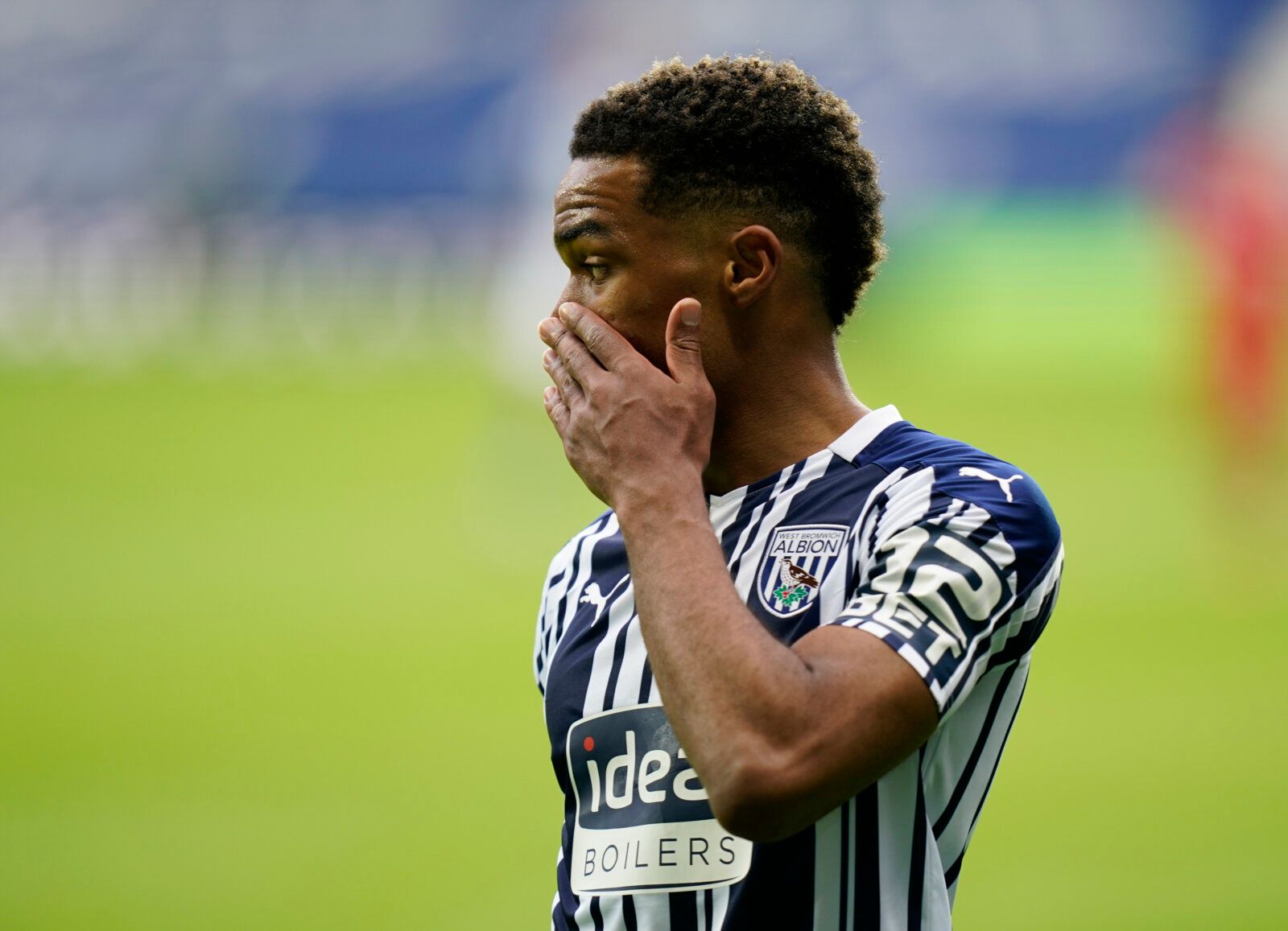Soccer Football - Premier League - West Bromwich Albion v Liverpool - The Hawthorns, West Bromwich, Britain - May 16, 2021 West Bromwich Albion's Grady Diangana reacts Pool via REUTERS/Tim Keeton EDITORIAL USE ONLY. No use with unauthorized audio, video, data, fixture lists, club/league logos or 'live' services. Online in-match use limited to 75 images, no video emulation. No use in betting, games or single club /league/player publications.  Please contact your account representative for further