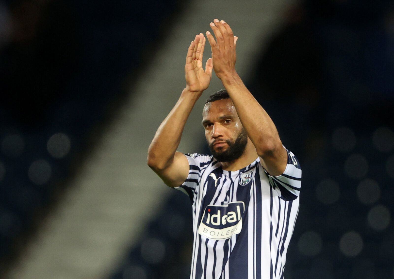 Soccer Football - Premier League - West Bromwich Albion v West Ham United - The Hawthorns, West Bromwich, Britain - May 19, 2021 West Bromwich Albion's Matt Phillips applauds fans during a lap of appreciation after the match, as a limited number of fans are permitted at outdoor sports venues Pool via REUTERS/Molly Darlington EDITORIAL USE ONLY. No use with unauthorized audio, video, data, fixture lists, club/league logos or 'live' services. Online in-match use limited to 75 images, no video emul