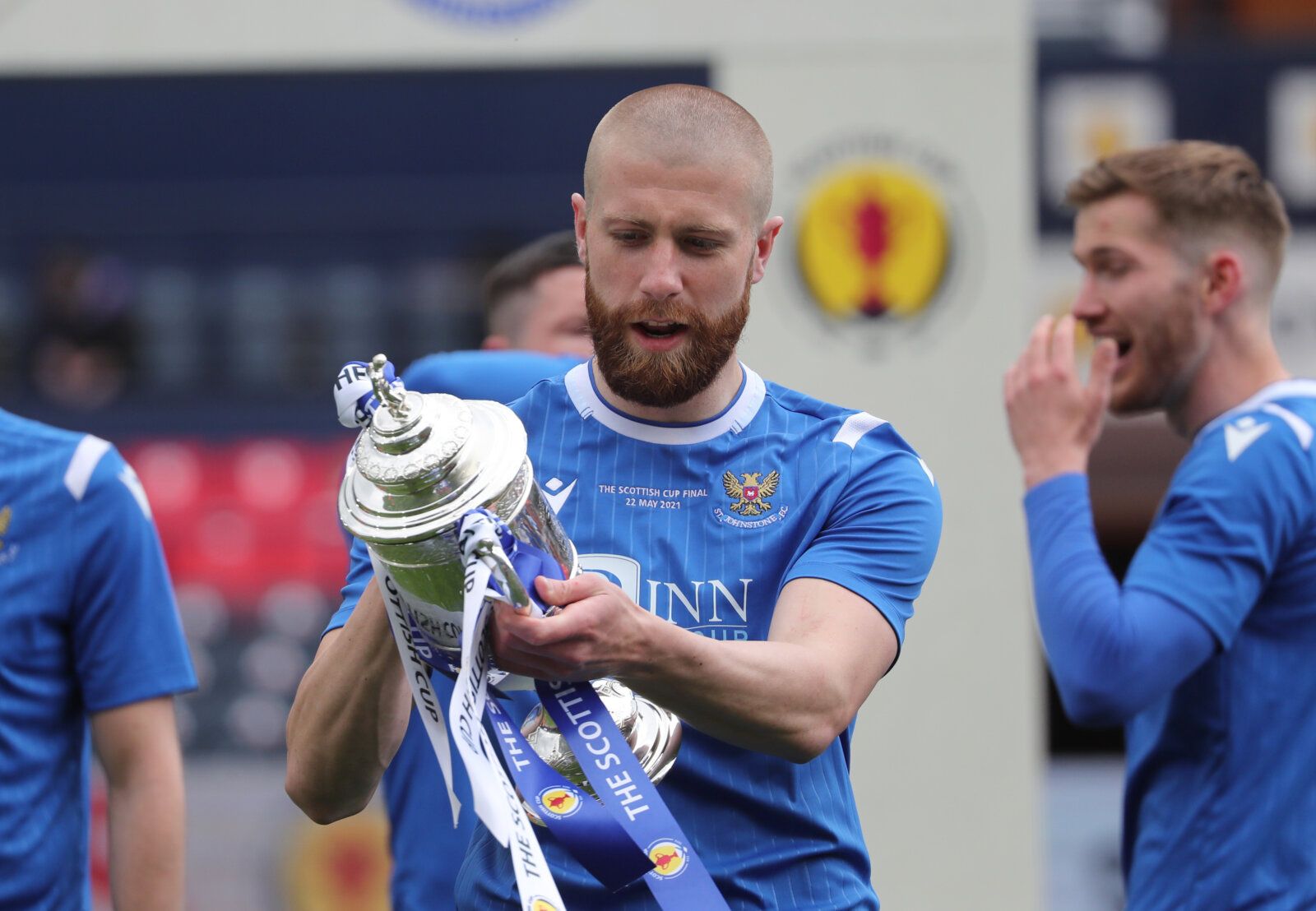 Soccer Football - Scottish Cup Final - St Johnstone v Hibernian - Hampden Park, Glasgow, Scotland, Britain - May 22, 2021 St Johnstone's Shaun Rooney celebrates with the trophy after winning the Scottish Cup Final REUTERS/Russell Cheyne