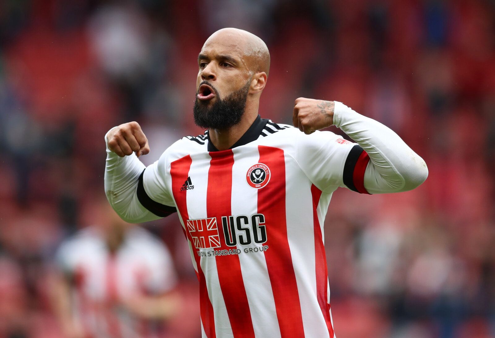 Soccer Football - Premier League - Sheffield United v Burnley - Bramall Lane, Sheffield, Britain - May 23, 2021 Burnley's David McGoldrick celebrates scoring their first goal Pool via REUTERS/Jan Kruger EDITORIAL USE ONLY. No use with unauthorized audio, video, data, fixture lists, club/league logos or 'live' services. Online in-match use limited to 75 images, no video emulation. No use in betting, games or single club /league/player publications.  Please contact your account representative for 