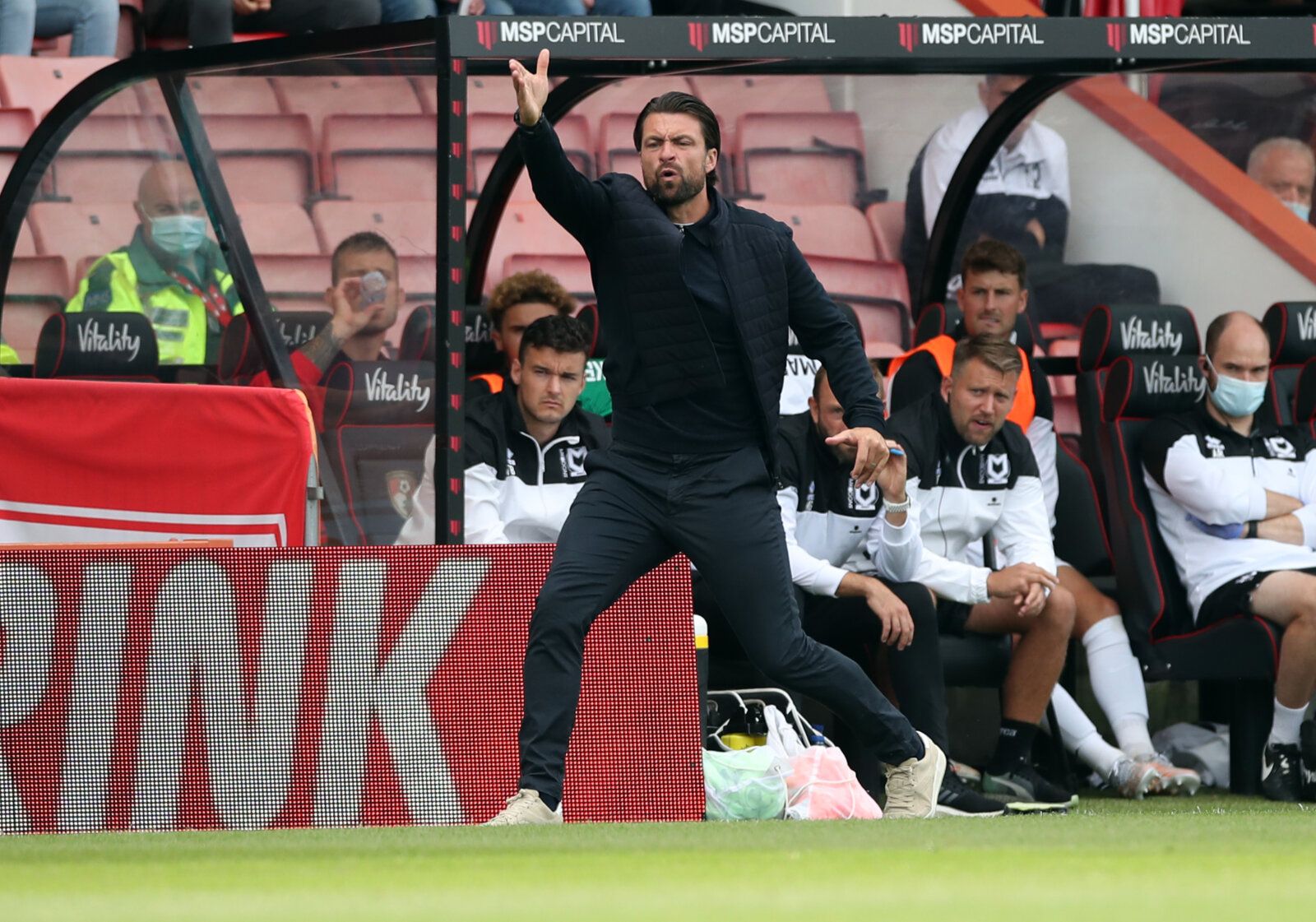 Soccer Football - Carabao Cup First Round - AFC Bournemouth v Milton Keynes Dons - Vitality Stadium, Bournemouth, Britain - July 31, 2021   Milton Keynes Dons manager Russell Martin reacts Action Images/Peter Cziborra