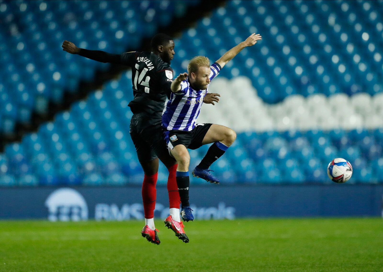 Soccer Football - Championship - Sheffield Wednesday v Brentford - Hillsborough, Sheffield, Britain - October 21, 2020  Sheffield Wednesdays' Barry Bannan in action with Brentford's Josh DaSilva Action Images/Lee Smith EDITORIAL USE ONLY. No use with unauthorized audio, video, data, fixture lists, club/league logos or 'live' services. Online in-match use limited to 75 images, no video emulation. No use in betting, games or single club /league/player publications.  Please contact your account rep