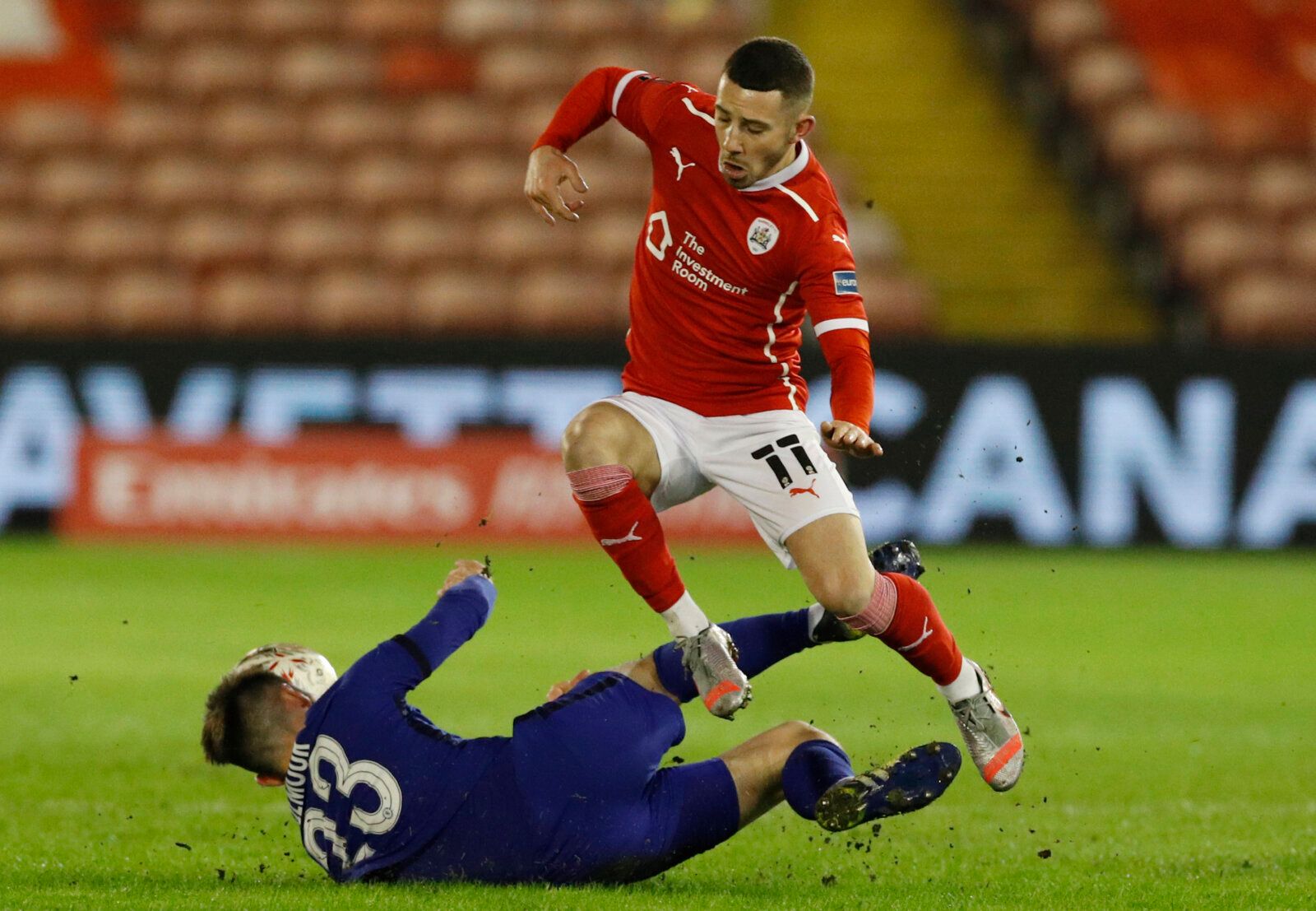 Soccer Football -  FA Cup - Fifth Round - Barnsley v Chelsea  - Oakwell, Barnsley, Britain - February 11, 2021 Chelsea's Billy Gilmour in action with Barnsley's Conor Chaplin REUTERS/Phil Noble