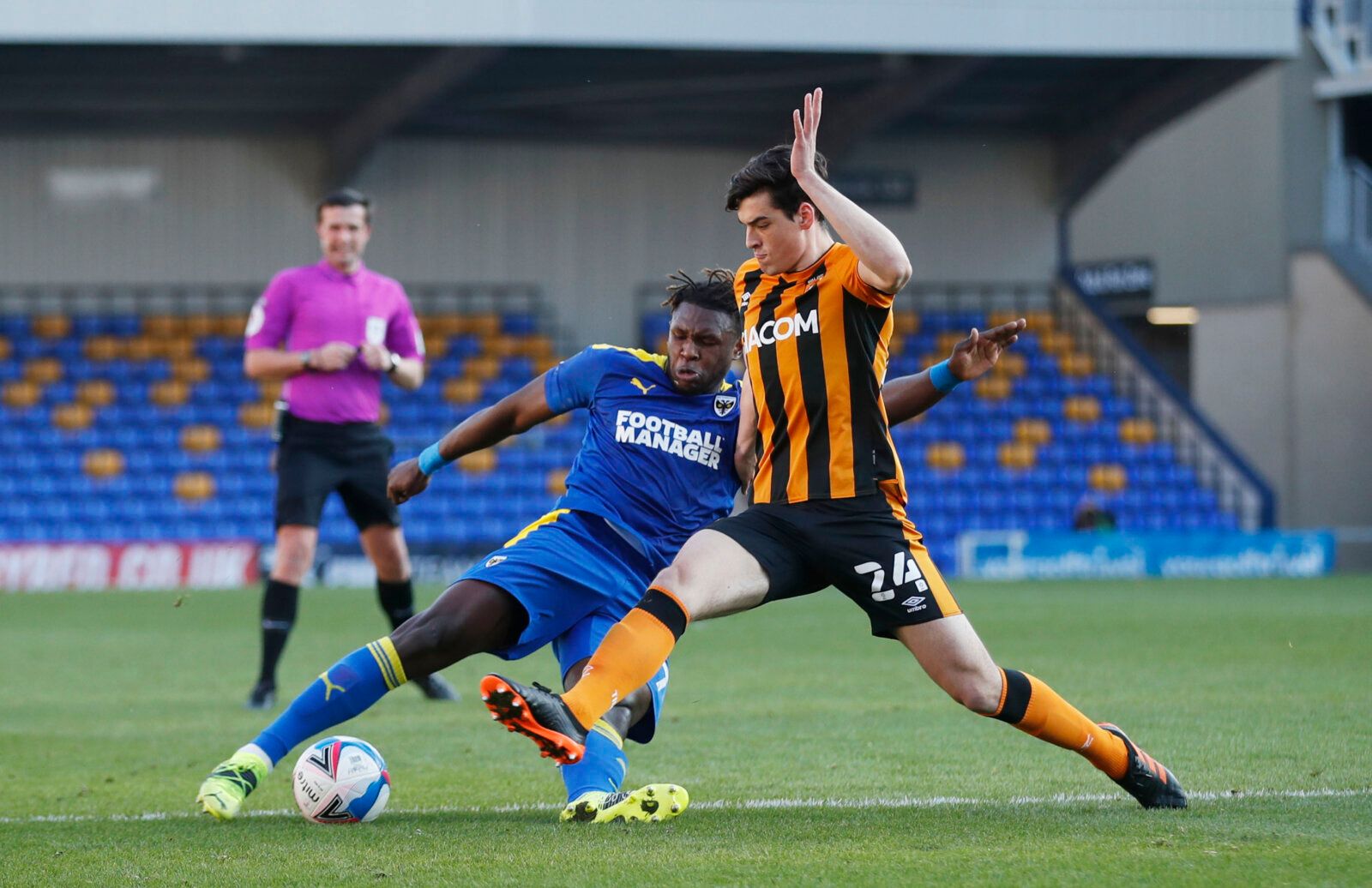 Soccer Football - League One - AFC Wimbledon v Hull City - Plough Lane, London, Britain - February 27, 2021 AFC Wimbledon’s Darnell Johnson in action with Hull’s Jacob Greaves Action Images/Matthew Childs EDITORIAL USE ONLY. No use with unauthorized audio, video, data, fixture lists, club/league logos or 'live' services. Online in-match use limited to 75 images, no video emulation. No use in betting, games or single club /league/player publications.  Please contact your account representative fo