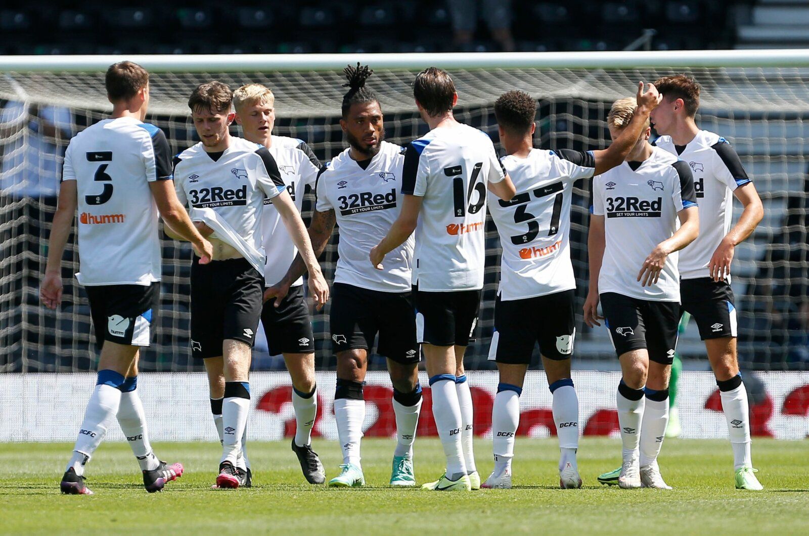 Soccer Football - Pre Season Friendly - Derby County v Manchester United - Pride Park, Derby, Britain - July 18, 2021 Derby County's Colin Kazim-Richards celebrates with teammates after scoring their first goal Action Images via Reuters/Craig Brough