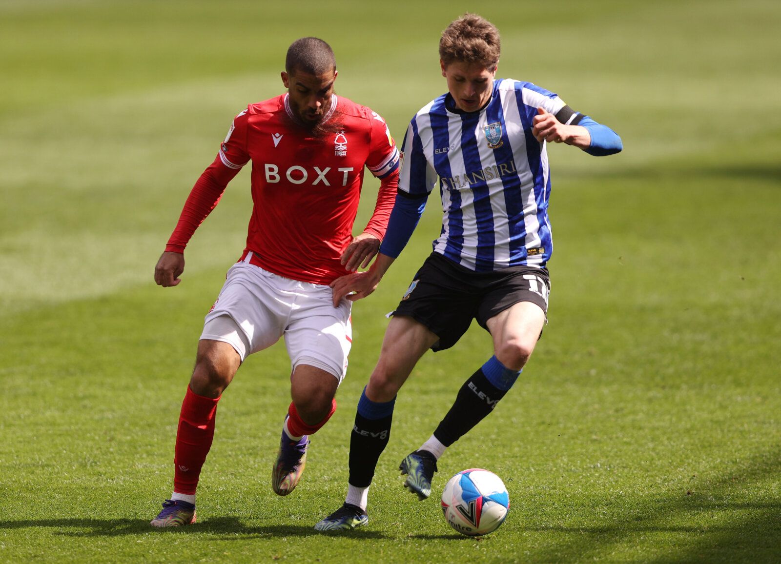 Soccer Football - Championship - Sheffield Wednesday v Nottingham Forest - Hillsborough, Sheffield, Britain - May 1, 2021 Nottingham Forest's Lewis Grabban in action with Sheffield Wednesday's Adam Reach Action Images/Molly Darlington EDITORIAL USE ONLY. No use with unauthorized audio, video, data, fixture lists, club/league logos or 'live' services. Online in-match use limited to 75 images, no video emulation. No use in betting, games or single club /league/player publications.  Please contact 