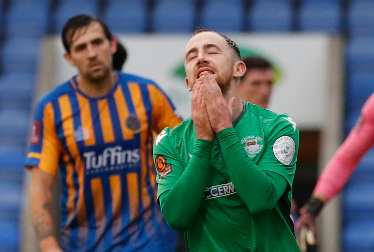 Soccer Football - FA Cup Second Round - Shrewsbury Town v Oxford City - Montgomery Waters Meadow, Shrewsbury, Britain - November 29, 2020 Oxford City's Lewis Coyle reacts after a shot is saved by Shrewsbury Town's Matija Sarkic Action Images/Andrew Boyers