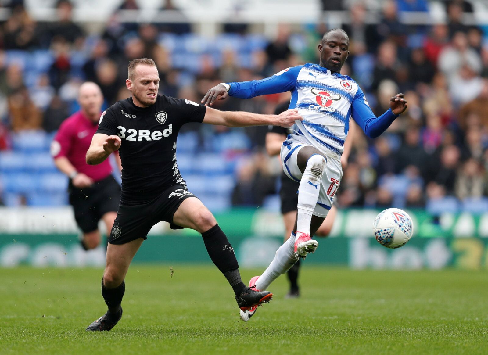 Soccer Football - Championship - Reading vs Leeds United - Madejski Stadium, Reading, Britain - March 10, 2018   Reading's Modou Barrow in action with Leeds United's Laurens De Bock   Action Images/Matthew Childs    EDITORIAL USE ONLY. No use with unauthorized audio, video, data, fixture lists, club/league logos or 