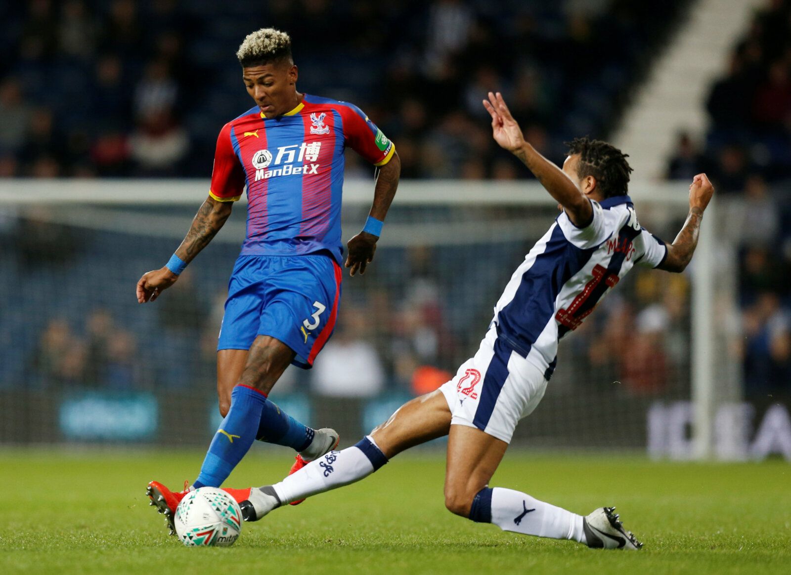 Soccer Football - Carabao Cup - Third Round - West Bromwich Albion v Crystal Palace - The Hawthorns, West Bromwich, Britain - September 25, 2018  Crystal Palace's Patrick van Aanholt in action with West Brom's Tyrone Mears  Action Images via Reuters/Ed Sykes  EDITORIAL USE ONLY. No use with unauthorized audio, video, data, fixture lists, club/league logos or 