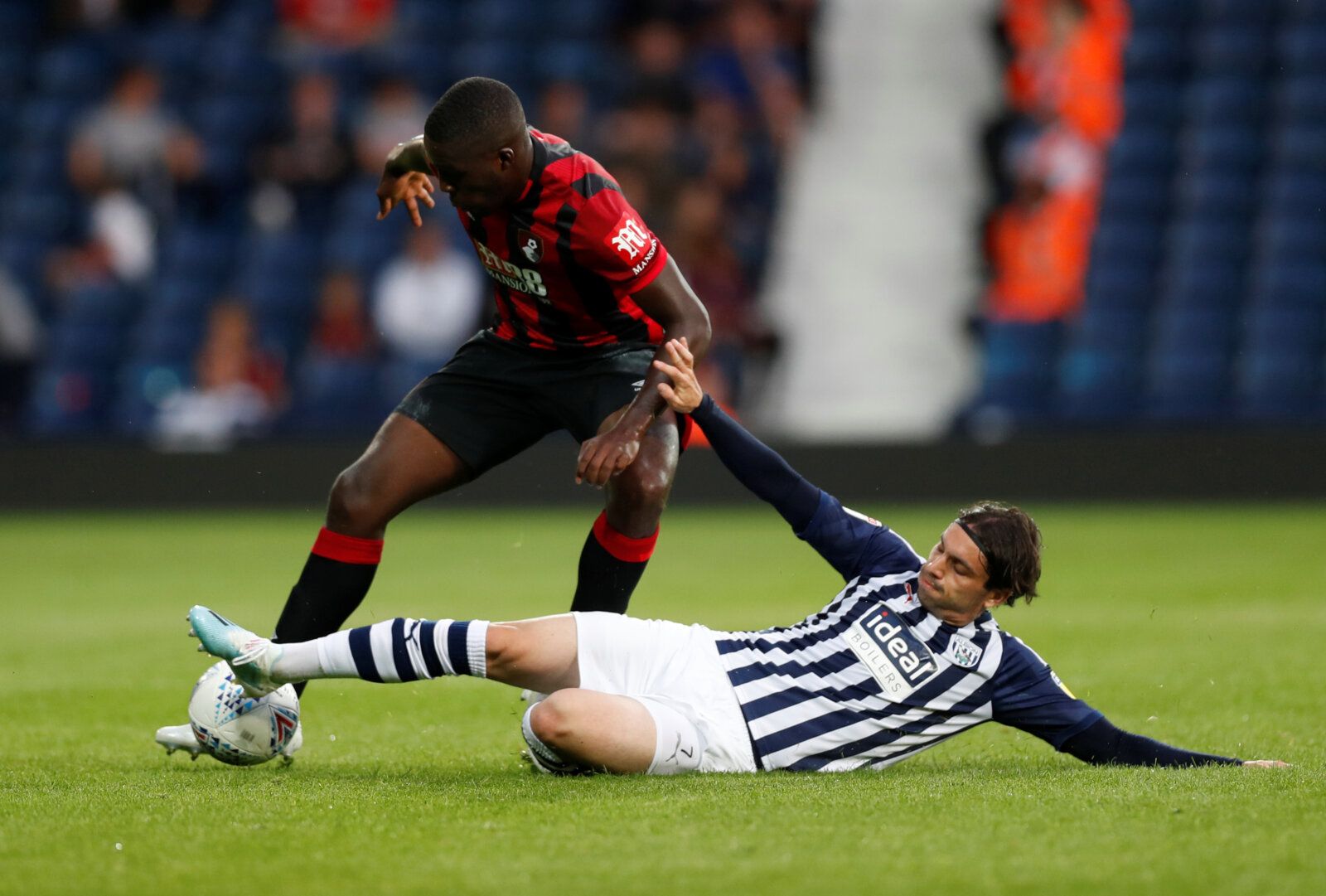 Soccer Football - Pre Season Friendly - West Bromwich Albion v AFC Bournemouth - The Hawthorns, West Bromwich, Britain - July 26, 2019   West Brom's Filip Krovinovic in action with AFC Bournemouth's Nnamdi Ofoborh   Action Images via Reuters/Matthew Childs