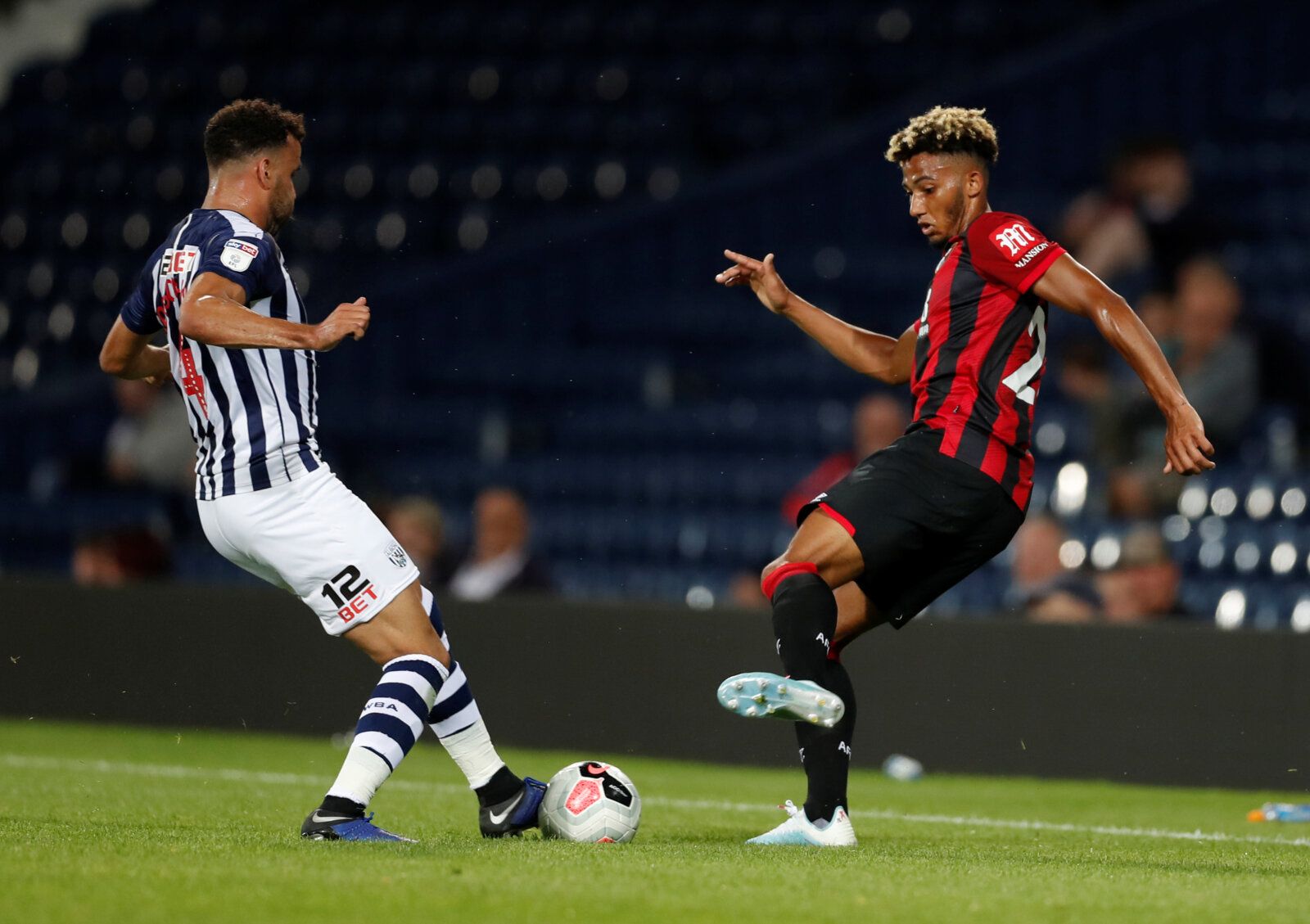Soccer Football - Pre Season Friendly - West Bromwich Albion v AFC Bournemouth - The Hawthorns, West Bromwich, Britain - July 26, 2019   Bournemouth's Lloyd Kelly in action with West Brom's Hal Robson-Kanu   Action Images via Reuters/Matthew Childs