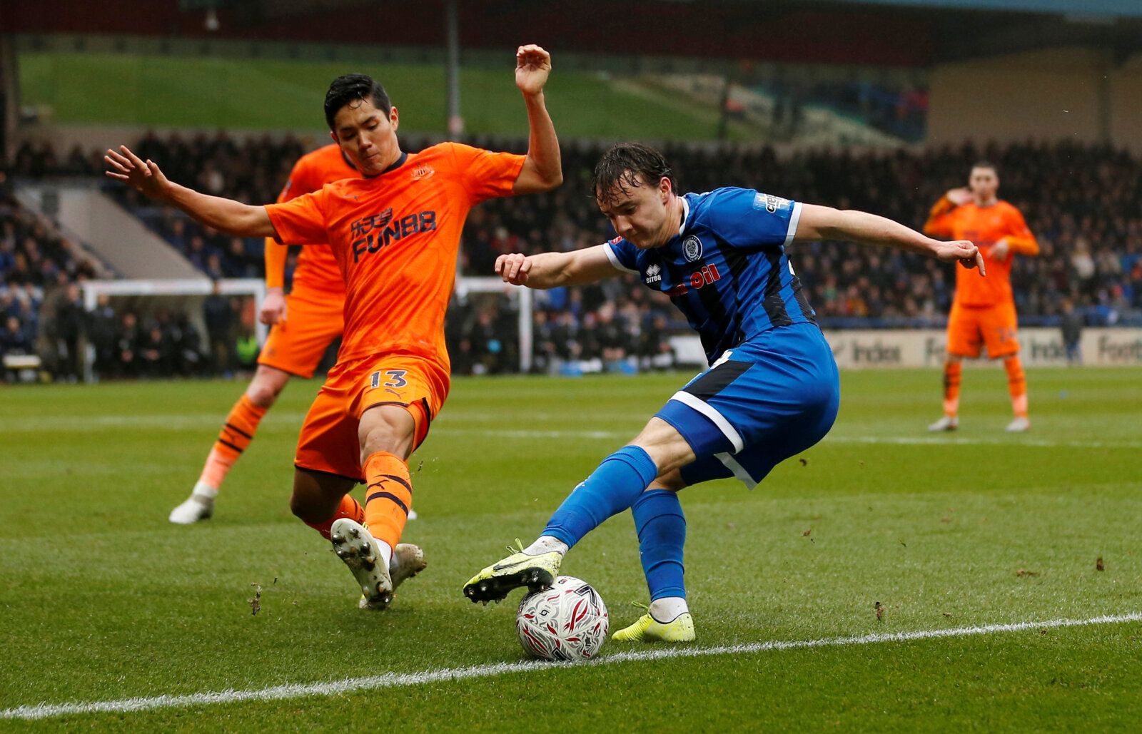 Soccer Football - FA Cup - Third Round - Rochdale v Newcastle United - The Crown Oil Arena, Rochdale, Britain - January 4, 2020  Newcastle United's Yoshinori Muto in action with Rochdale's Oliver Rathbone           Action Images via Reuters/Craig Brough