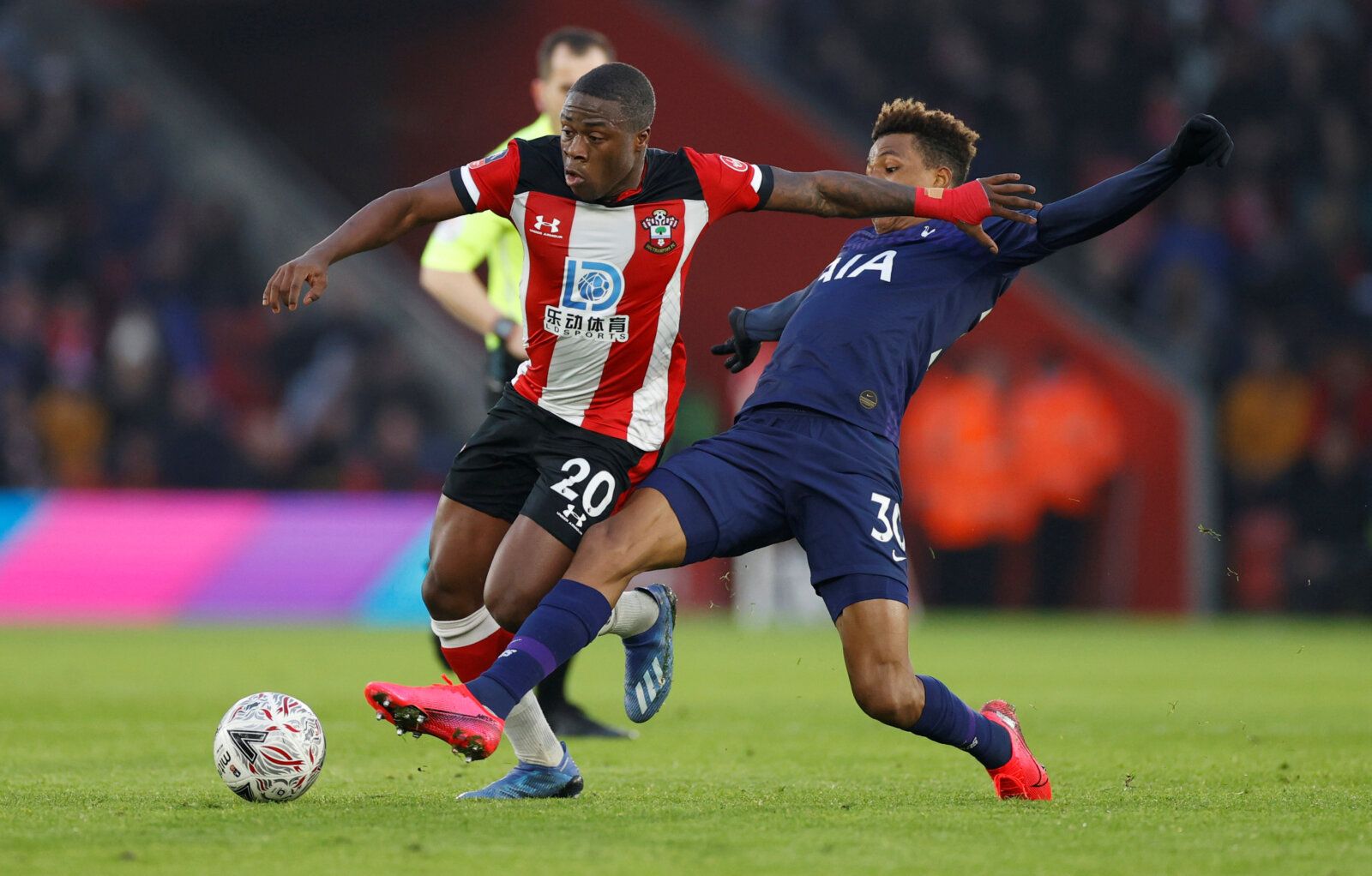 Soccer Football - FA Cup Fourth Round - Southampton v Tottenham Hotspur - St Mary's Stadium, Southampton, Britain - January 25, 2020  Southampton's Michael Obafemi in action with Tottenham Hotspur's Gedson Fernandes      Action Images via Reuters/John Sibley