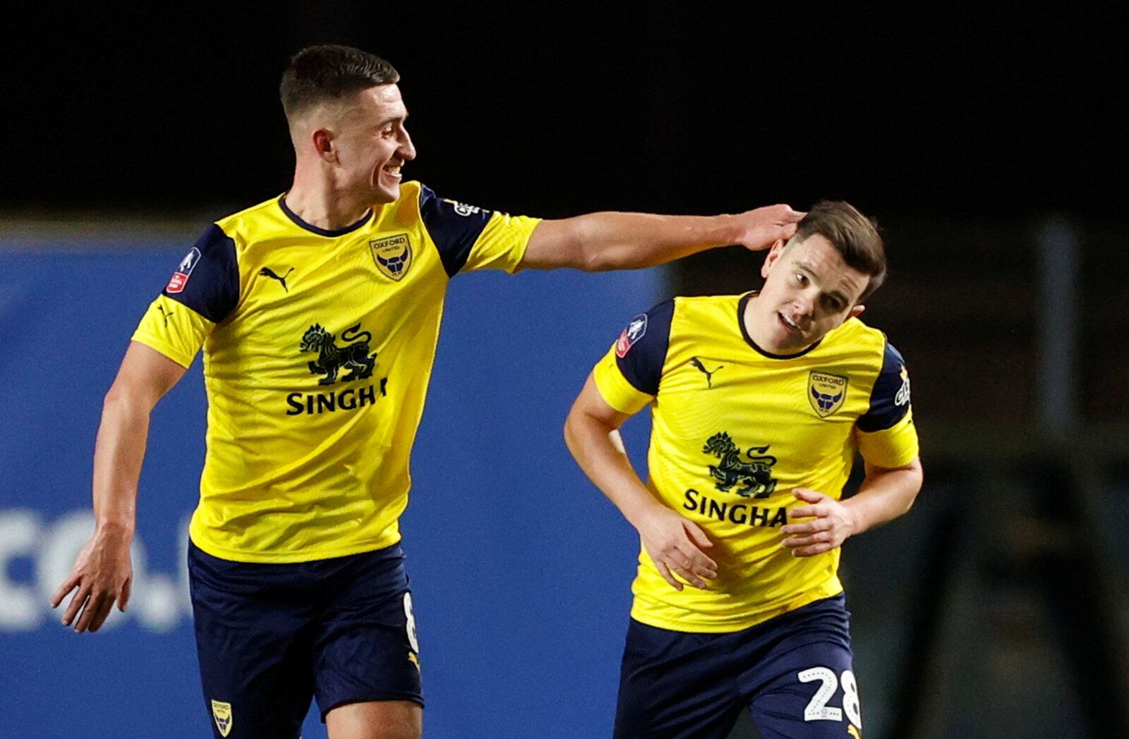 Soccer Football -  FA Cup Fourth Round Replay - Oxford United v Newcastle United  - Kassam Stadium, Oxford, Britain - February 4, 2020  Oxford United's Liam Kelly celebrates scoring their first goal with teammates         Action Images via Reuters/John Sibley