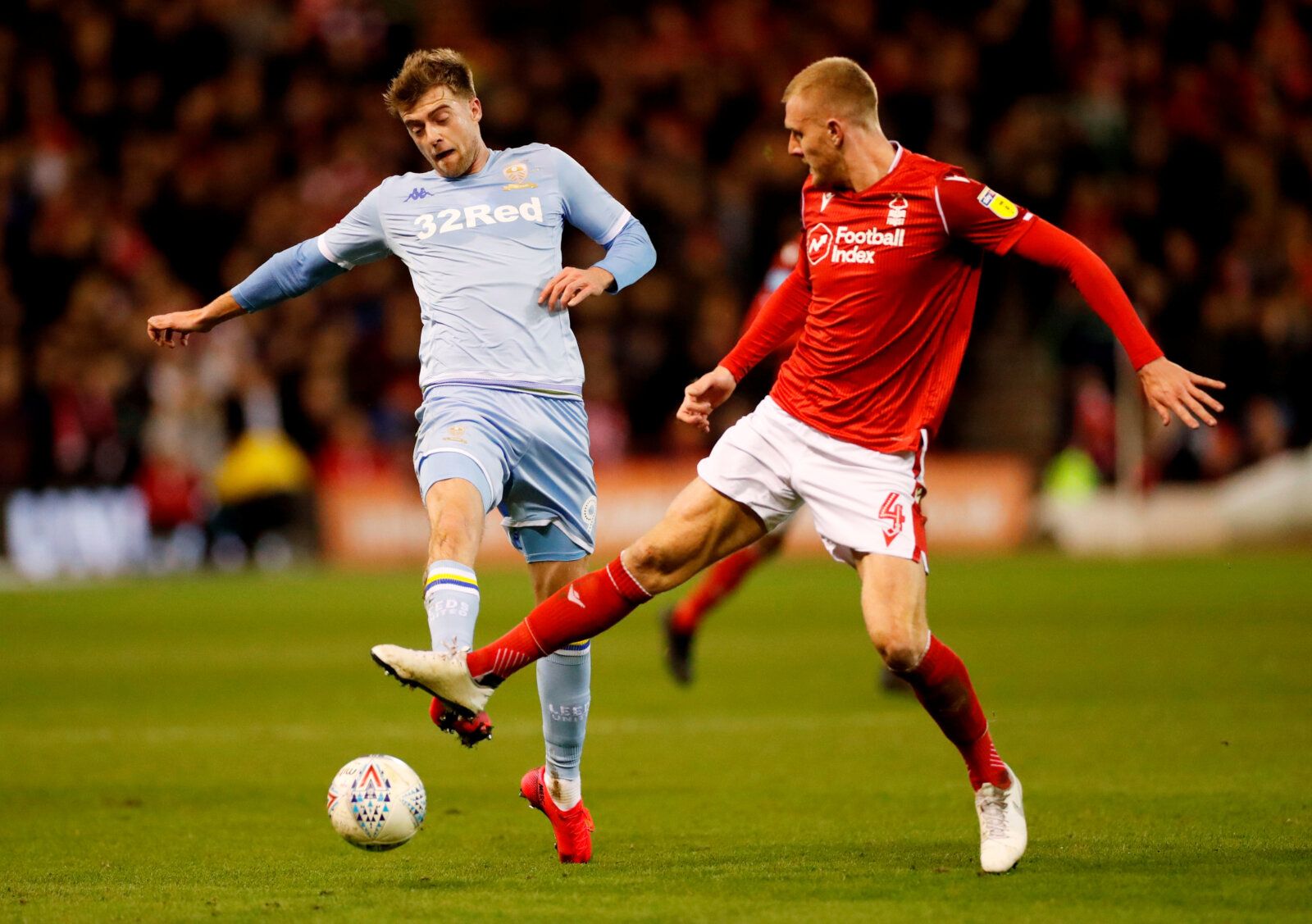 Soccer Football - Championship - Nottingham Forest v Leeds United - The City Ground, Nottingham, Britain - February 8, 2020  Nottingham Forest's Joe Worrall in action with Leeds United's Patrick Bamford   Action Images/Andrew Boyers  EDITORIAL USE ONLY. No use with unauthorized audio, video, data, fixture lists, club/league logos or 