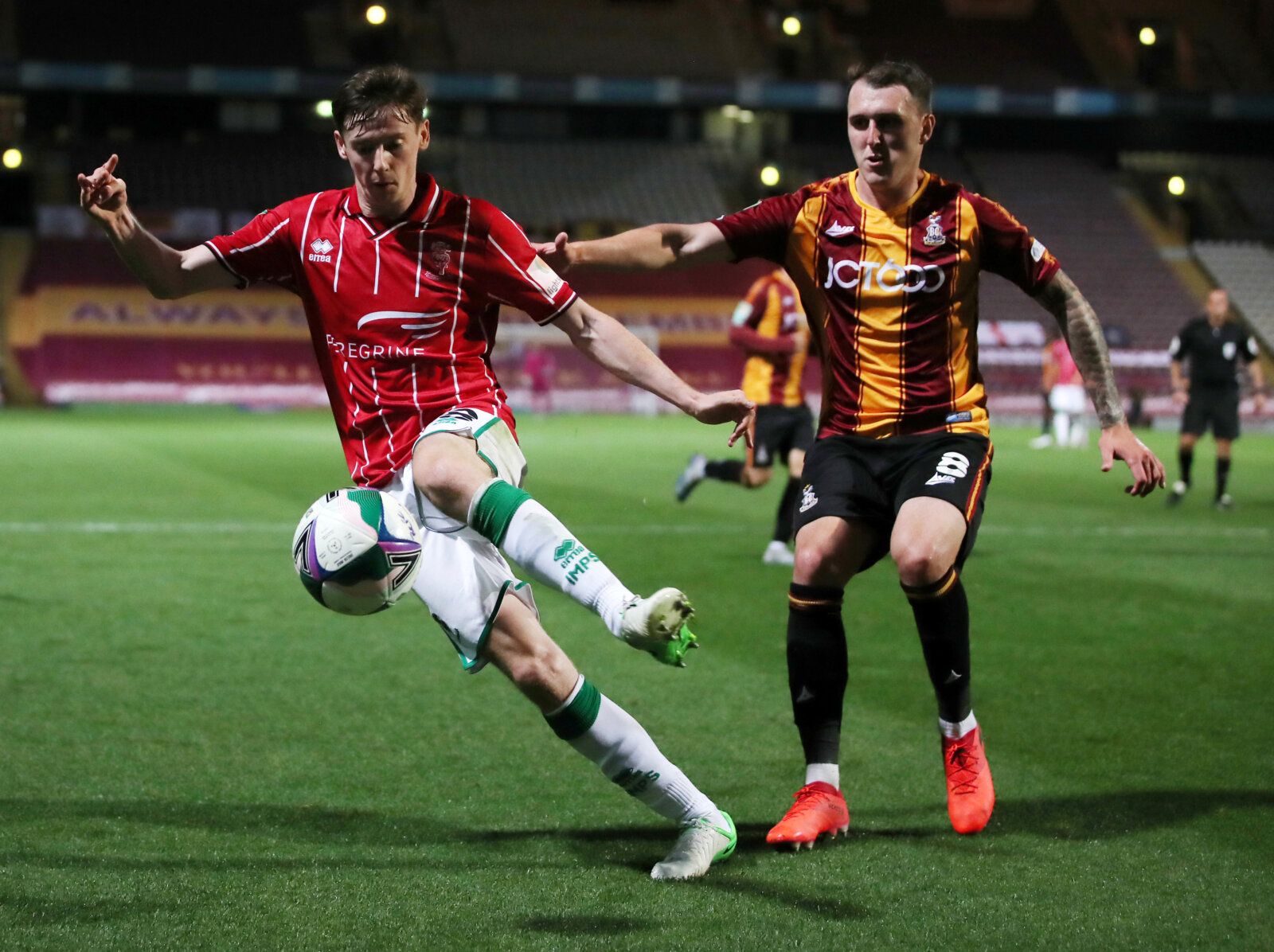 Soccer Football - Carabao Cup Second Round - Bradford City v Lincoln City - Northern Commercials Stadium, Bradford, Britain - September 15, 2020   Lincoln City's Conor McGrandles in action with Bradford City's Callum Cooke   Action Images/Molly Darlington    EDITORIAL USE ONLY. No use with unauthorized audio, video, data, fixture lists, club/league logos or 
