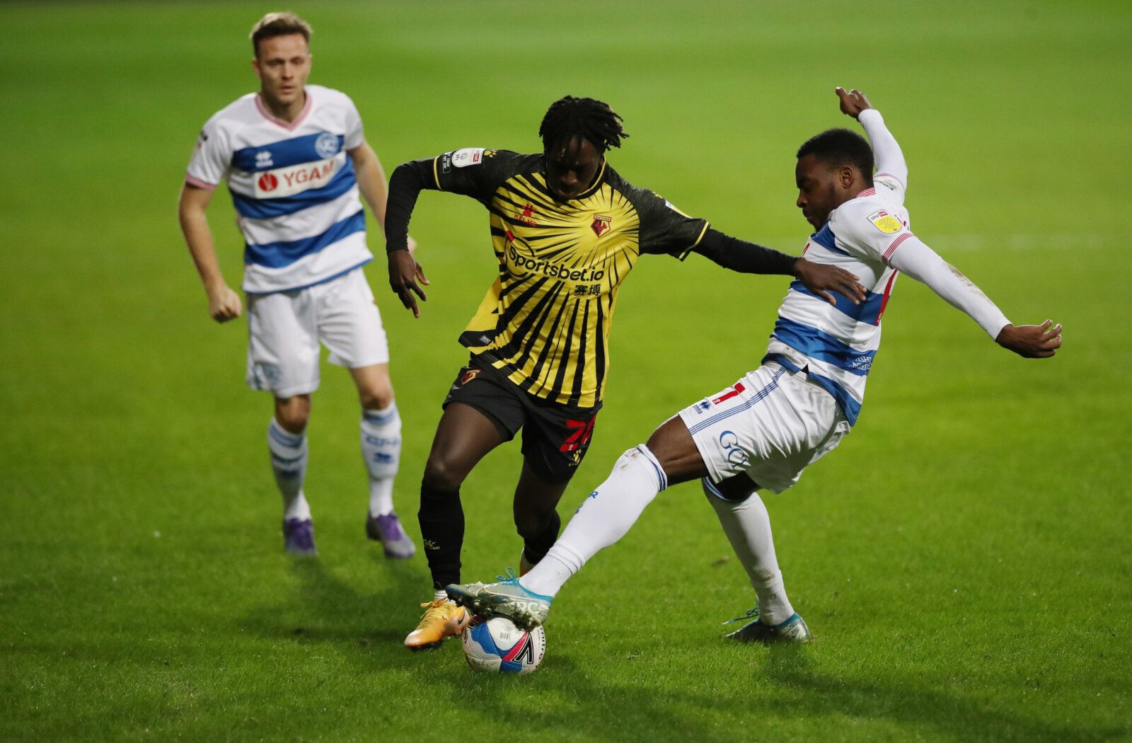 Soccer Football - Championship - Queens Park Rangers v Watford - Loftus Road, London, Britain - November 21, 2020 QPR's Bright Samuel in action with Watford's Domingos Quina Action Images/Peter Cziborra EDITORIAL USE ONLY. No use with unauthorized audio, video, data, fixture lists, club/league logos or 'live' services. Online in-match use limited to 75 images, no video emulation. No use in betting, games or single club /league/player publications.  Please contact your account representative for 