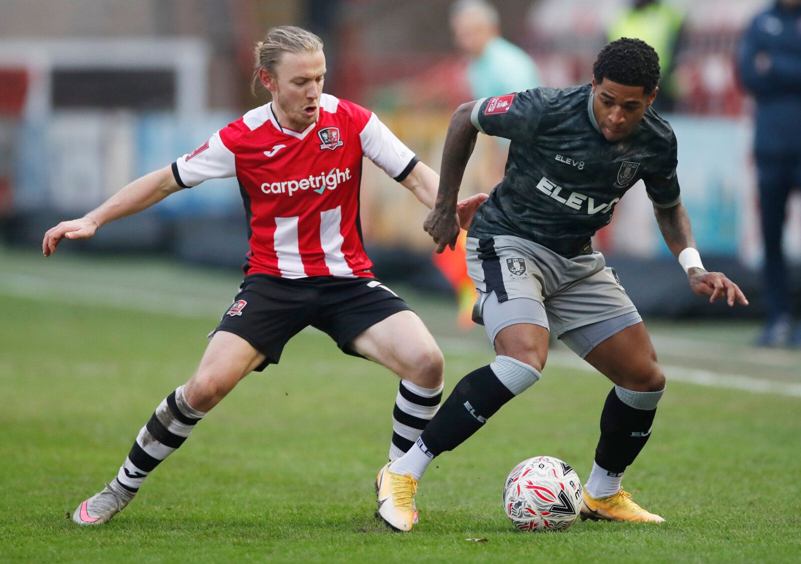 Soccer Football - FA Cup - Third Round - Exeter City v Sheffield Wednesday - St James Park, Exeter, Britain - January 9, 2021  Exeter City's Matt Jay in action with Sheffield Wednesday's Kadeem Harris Action Images via Reuters/Paul Childs