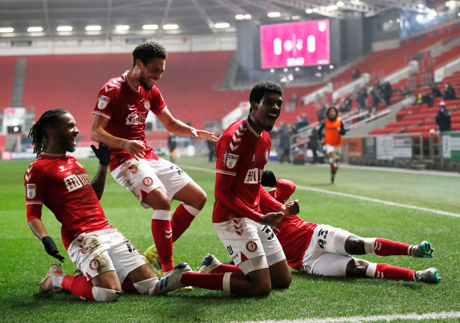 Soccer Football - Championship - Bristol City v AFC Bournemouth - Ashton Gate Stadium, Bristol, Britain - March 3, 2021 Bristol City's Tyreeq Bakinson celebrates scoring their first goal with teammates Action Images/Paul Childs EDITORIAL USE ONLY. No use with unauthorized audio, video, data, fixture lists, club/league logos or 'live' services. Online in-match use limited to 75 images, no video emulation. No use in betting, games or single club /league/player publications.  Please contact your ac